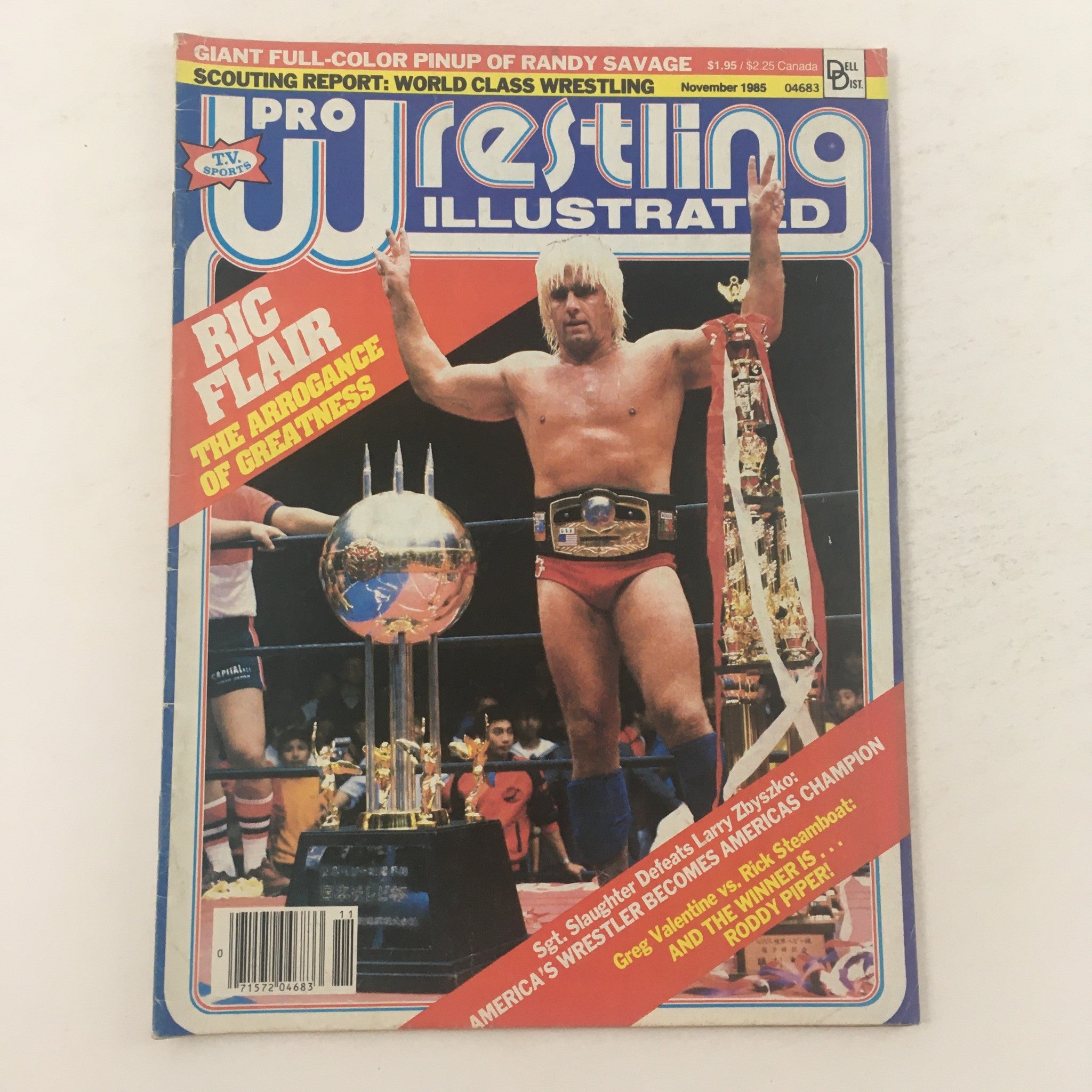 Pro Wrestling Illustrated November 1985 cover featuring Ric Flair, showcasing his title as 'The Arrogance of Greatness' with a trophy in the wrestling ring.