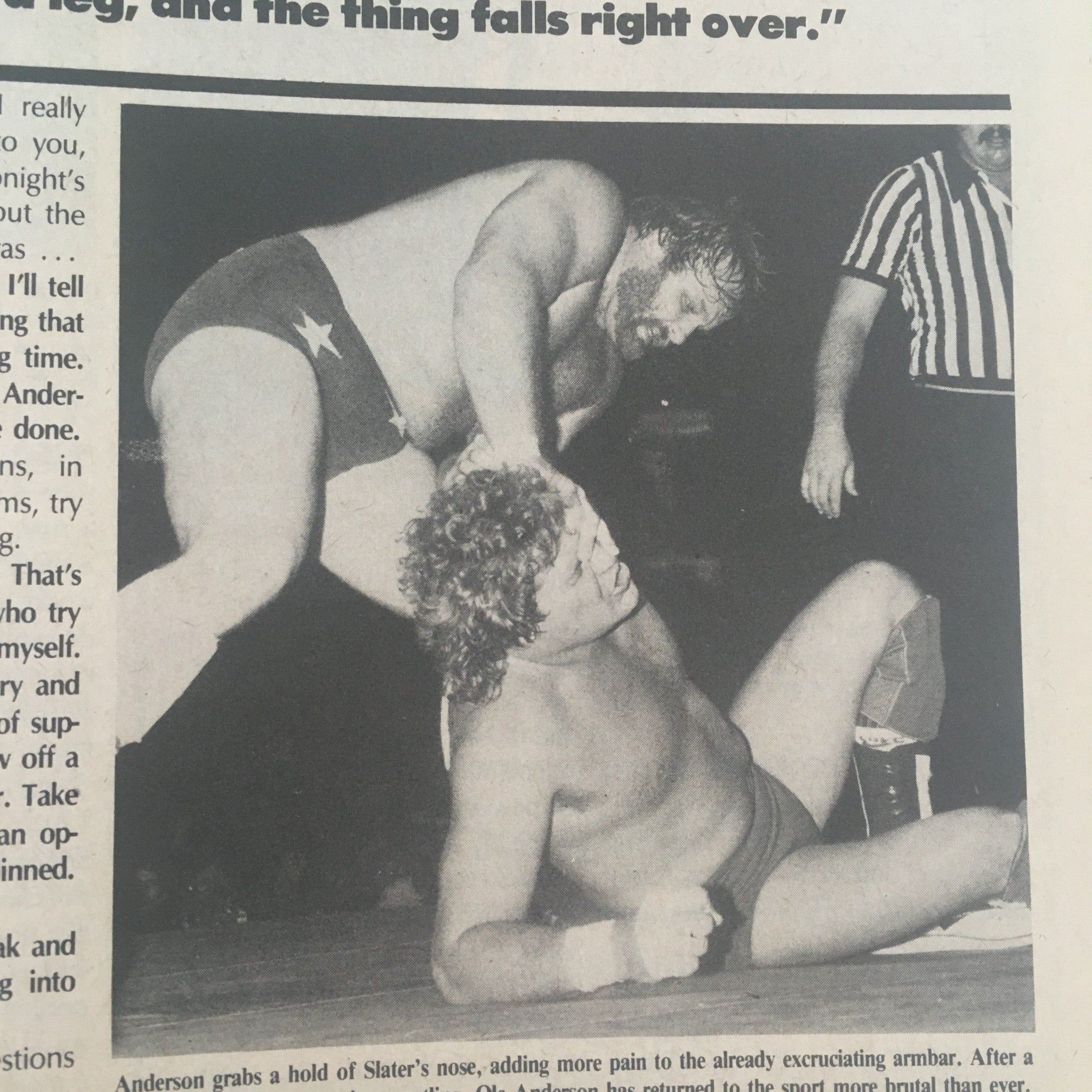 Pro Wrestling Illustrated November 1985 Ric Flair & Roddy Piper - Action shot of wrestlers in a match, showcasing Anderson grappling with Slater's nose during an intense moment.