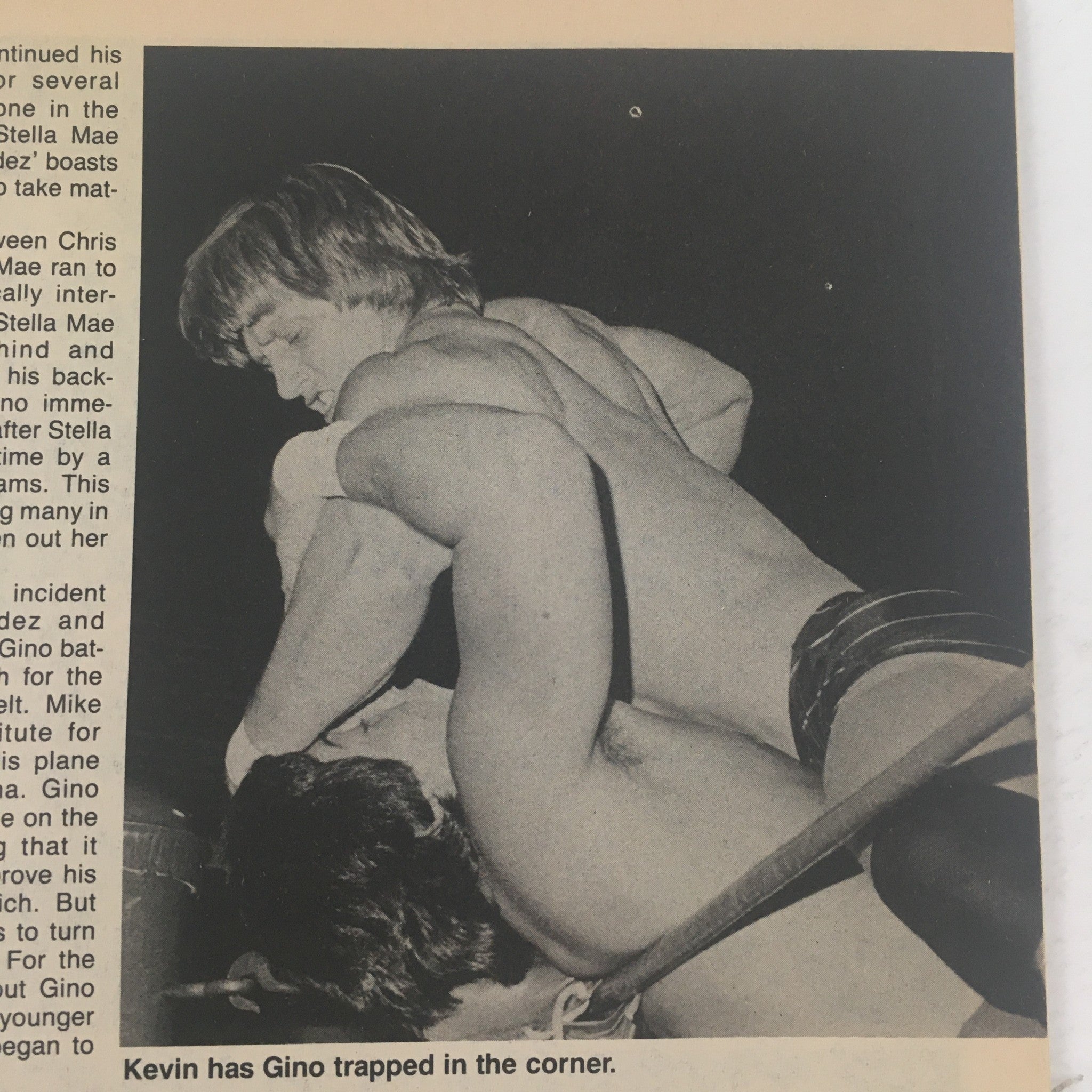 Wrestling Scene's Ringside January 1985 Gino Hernandez Kevin Von Erich in a wrestling match, showcasing Kevin Von Erich trapping Gino Hernandez in the corner during an intense moment.