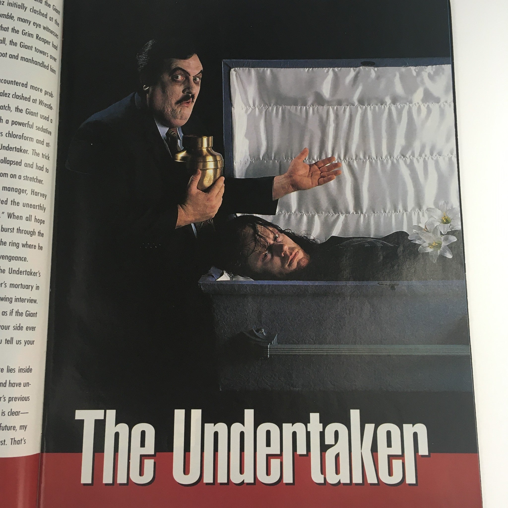 A page from WWF Magazine July 1993 featuring an article about The Undertaker, showcasing a dramatic image with Paul Bearer in a funeral setting.