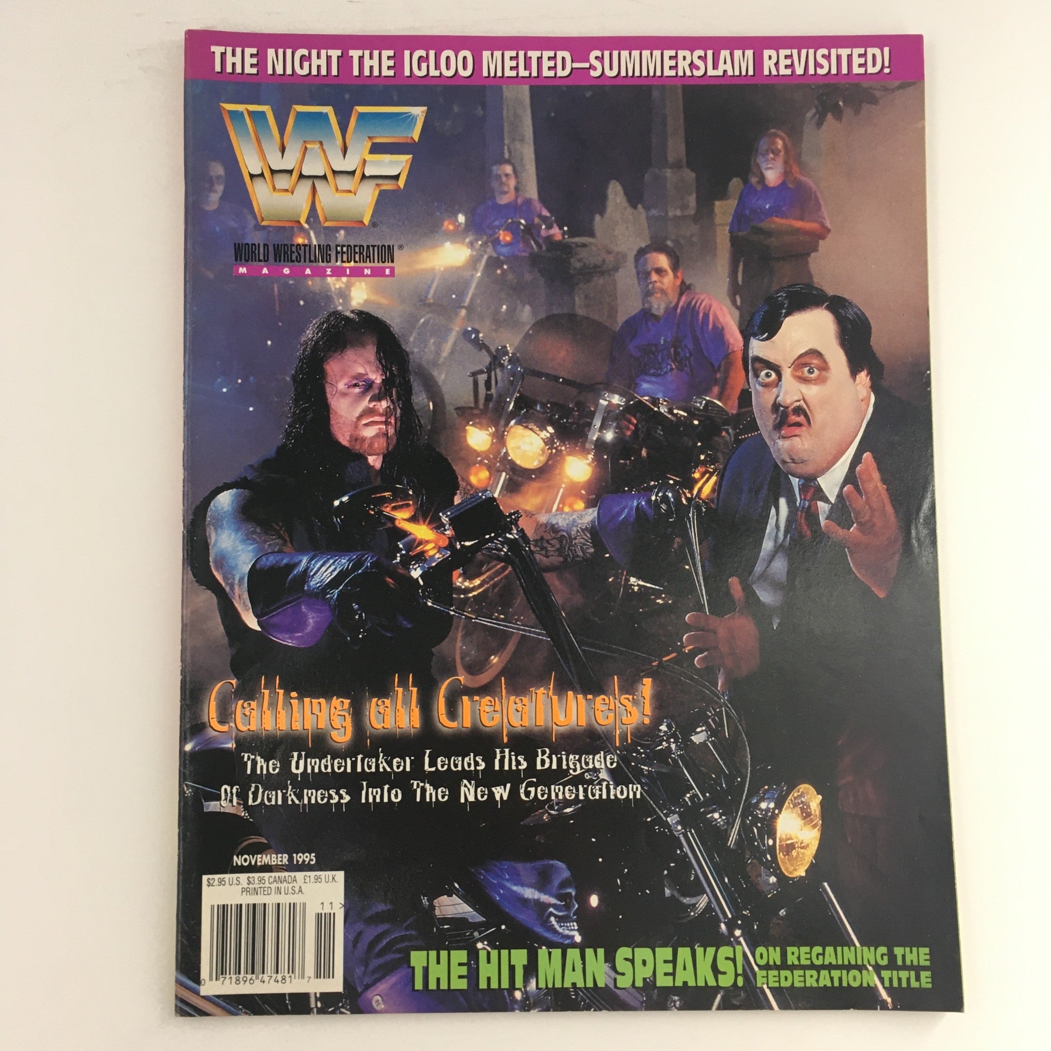 WWF Magazine November 1995 featuring The Undertaker and The Hit Man on the cover, highlighting a pivotal moment in professional wrestling history.