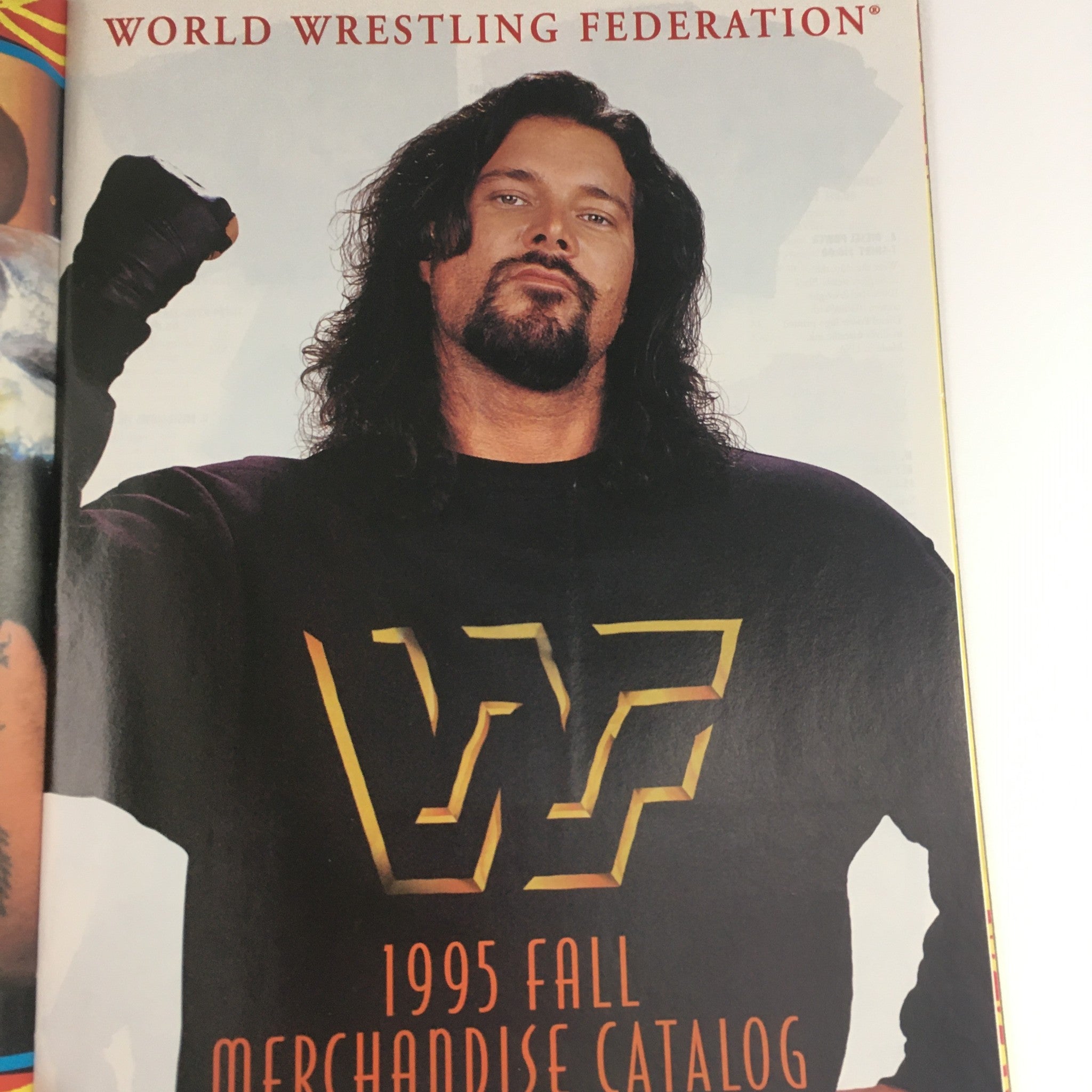 Page from WWF Magazine November 1995 showcasing a merchandise catalog with wrestling themes, featuring the iconic WWF logo.