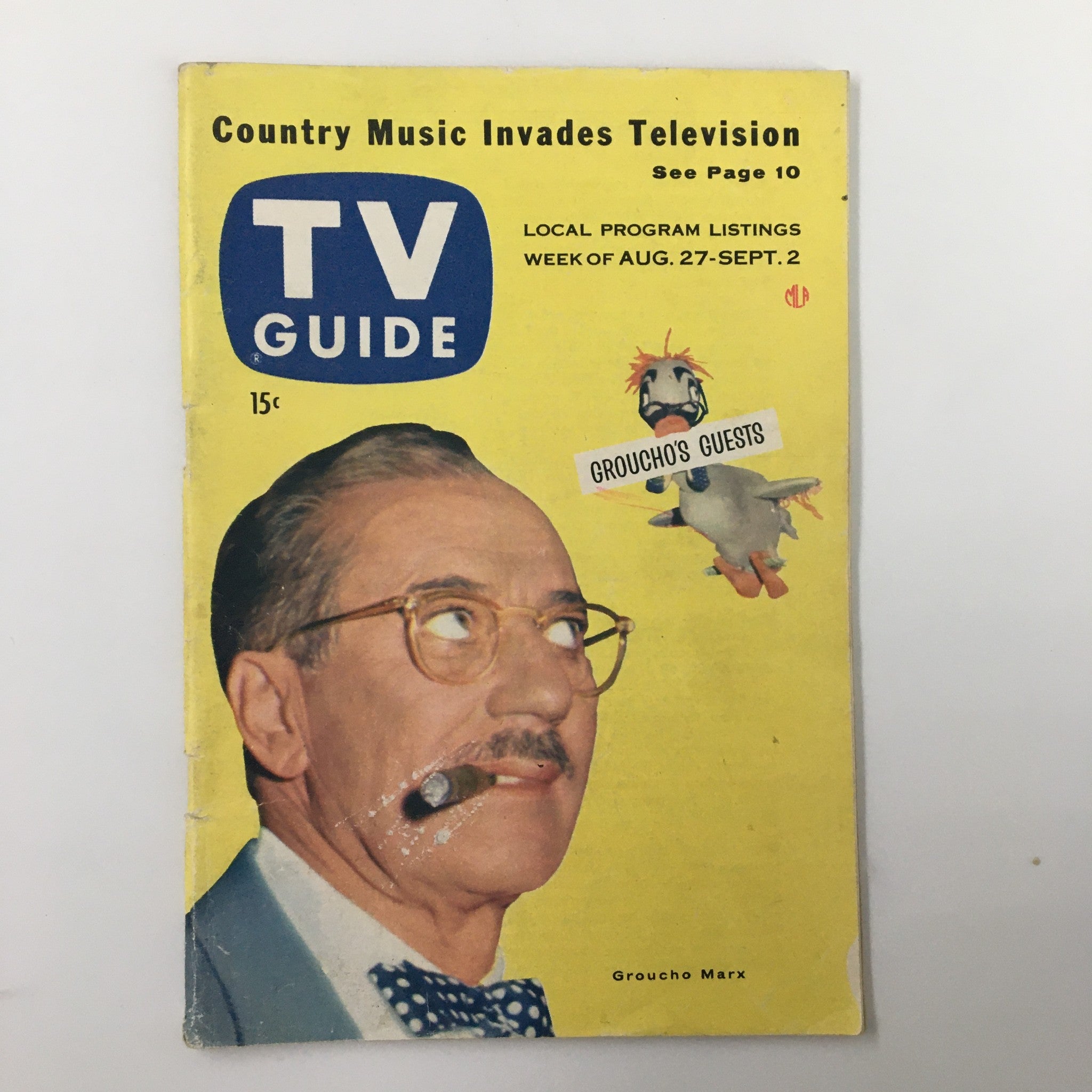 August 27, 1955 edition of TV Guide Magazine featuring Groucho Marx on the cover, showcasing classic television art and nostalgia.