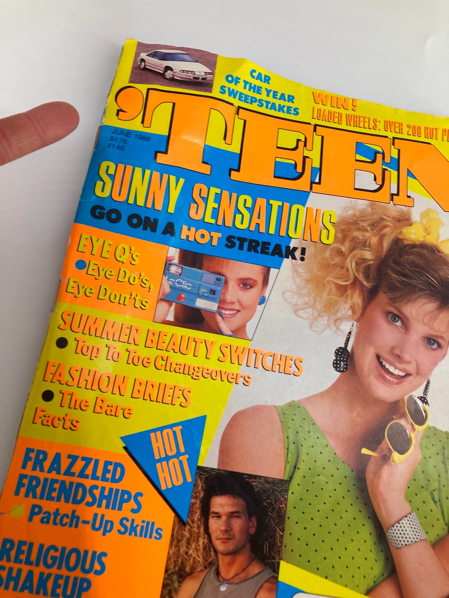 Close-up view of the VTG Teen Magazine June 1988 cover with Patrick Swayze, highlighting colorful headlines and nostalgic 80s elements such as sunglasses and a polka dot dress.