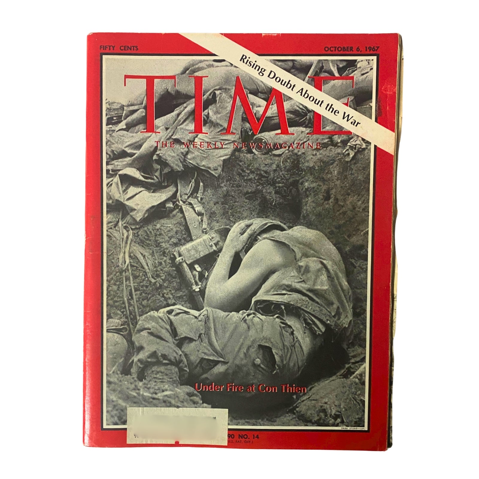 Cover of Time Magazine, October 6, 1967, featuring the title 'Under Fire at Con Thien,' showcasing the intense fighting in Vietnam with a poignant image of a soldier in a trench. Vol 90 No. 14 highlights the battle at a critical U.S. Marine Corps outpost.
