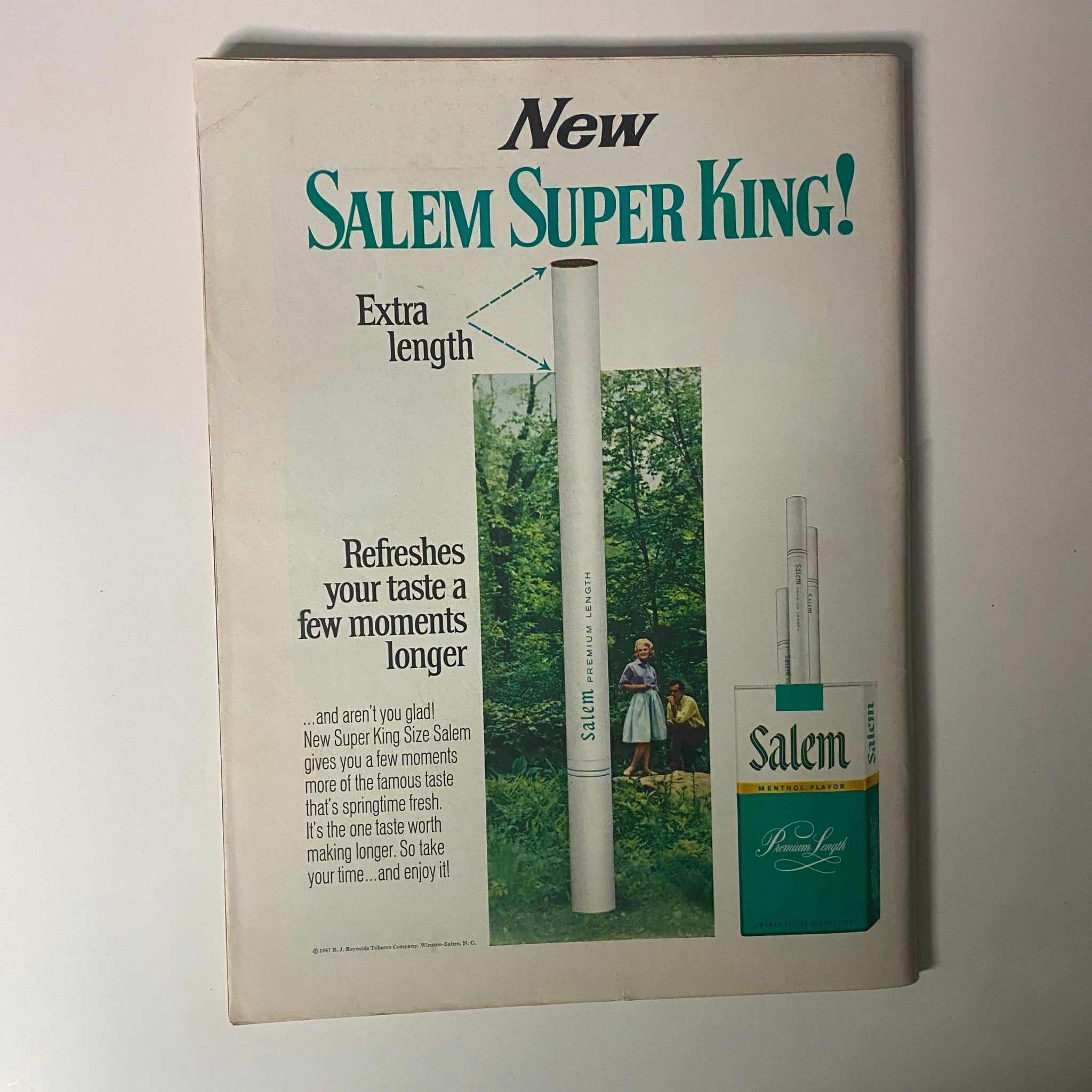 Advertisement page for Salem Super King cigarettes in Time Magazine, promoting the product's extra length and refreshing taste.