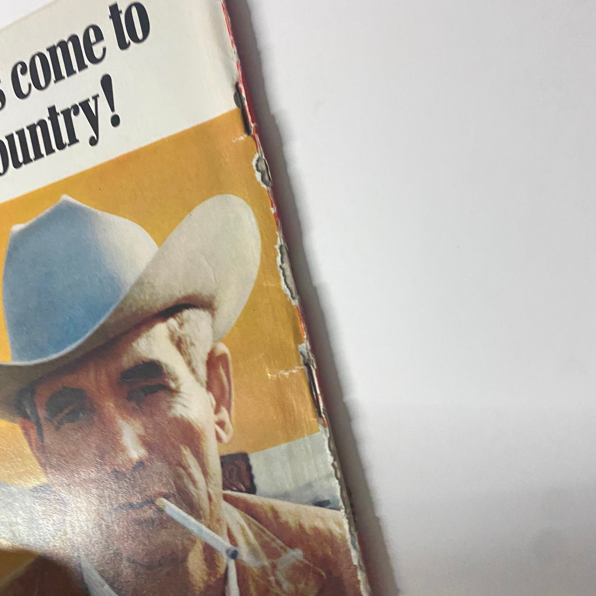 Close-up of advertisement from Time Magazine for New Marlboro 100's, highlighting the cowboy figure and branding, from the August 25, 1967 edition.