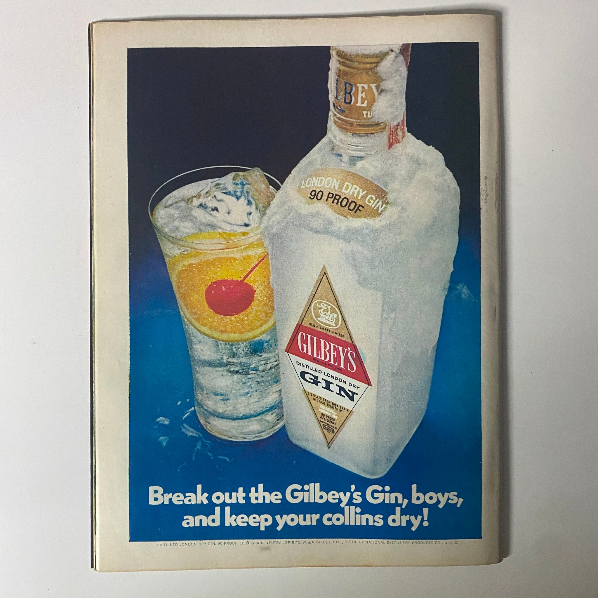 Advertisement for Gilbey's Gin featured in Time Magazine July 31, 1972, showcasing a chilled bottle of gin with a cocktail.