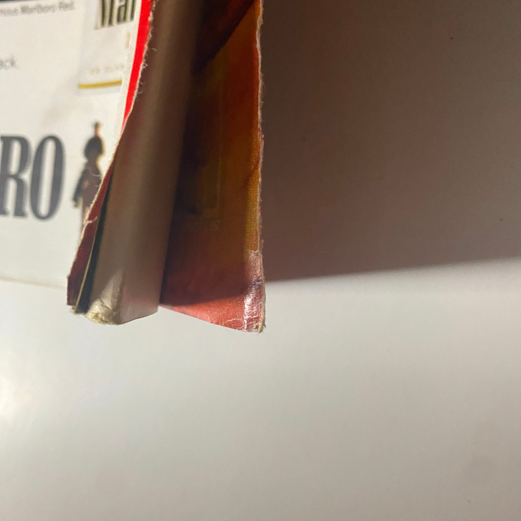 Side view of Time Magazine October 27, 1967 displaying worn edges and spine, highlighting its vintage quality.