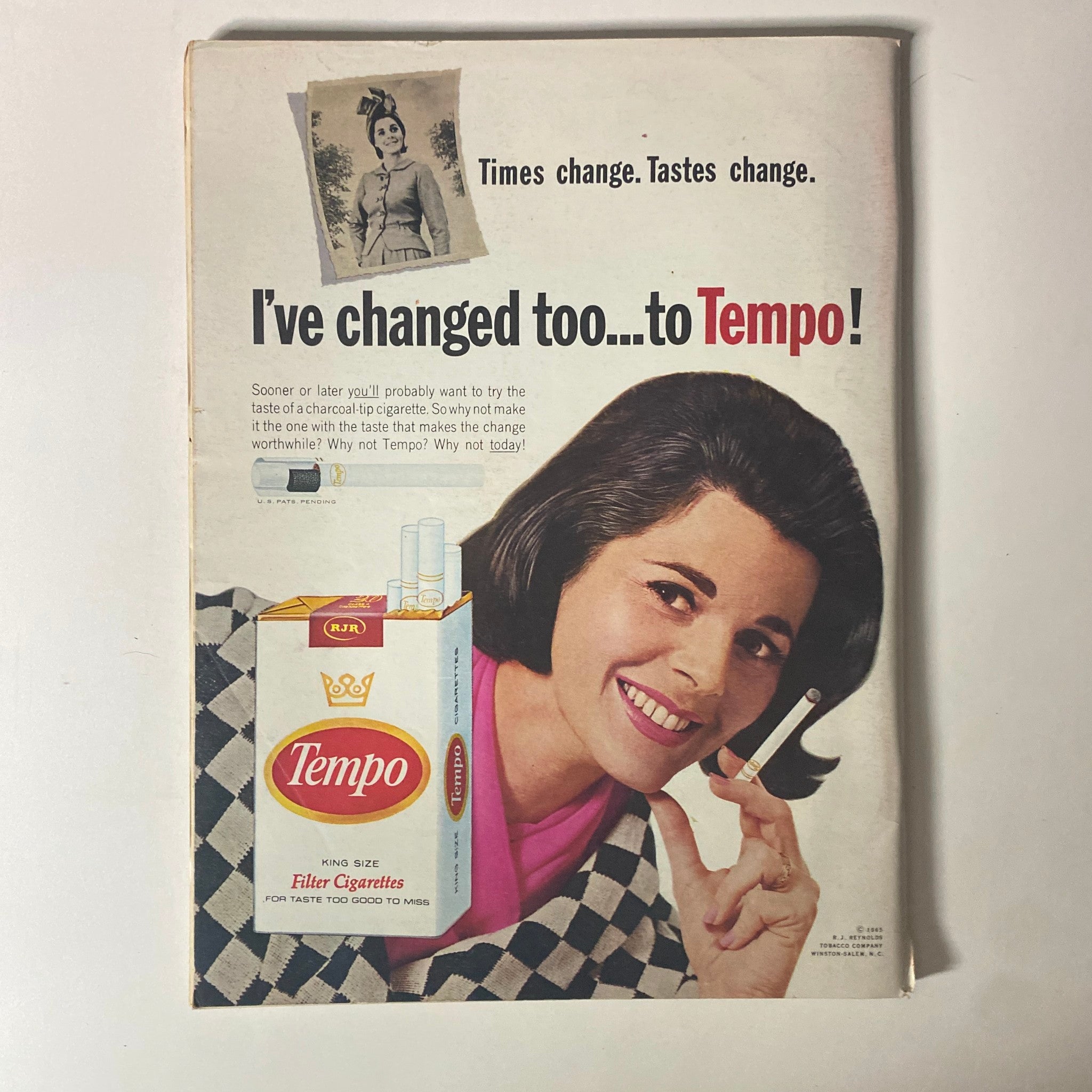 Back cover advertisement from Time Magazine November 18, 1966 Vol 88 No. 21 promoting Tempo cigarettes, featuring a woman smiling and holding a cigarette.