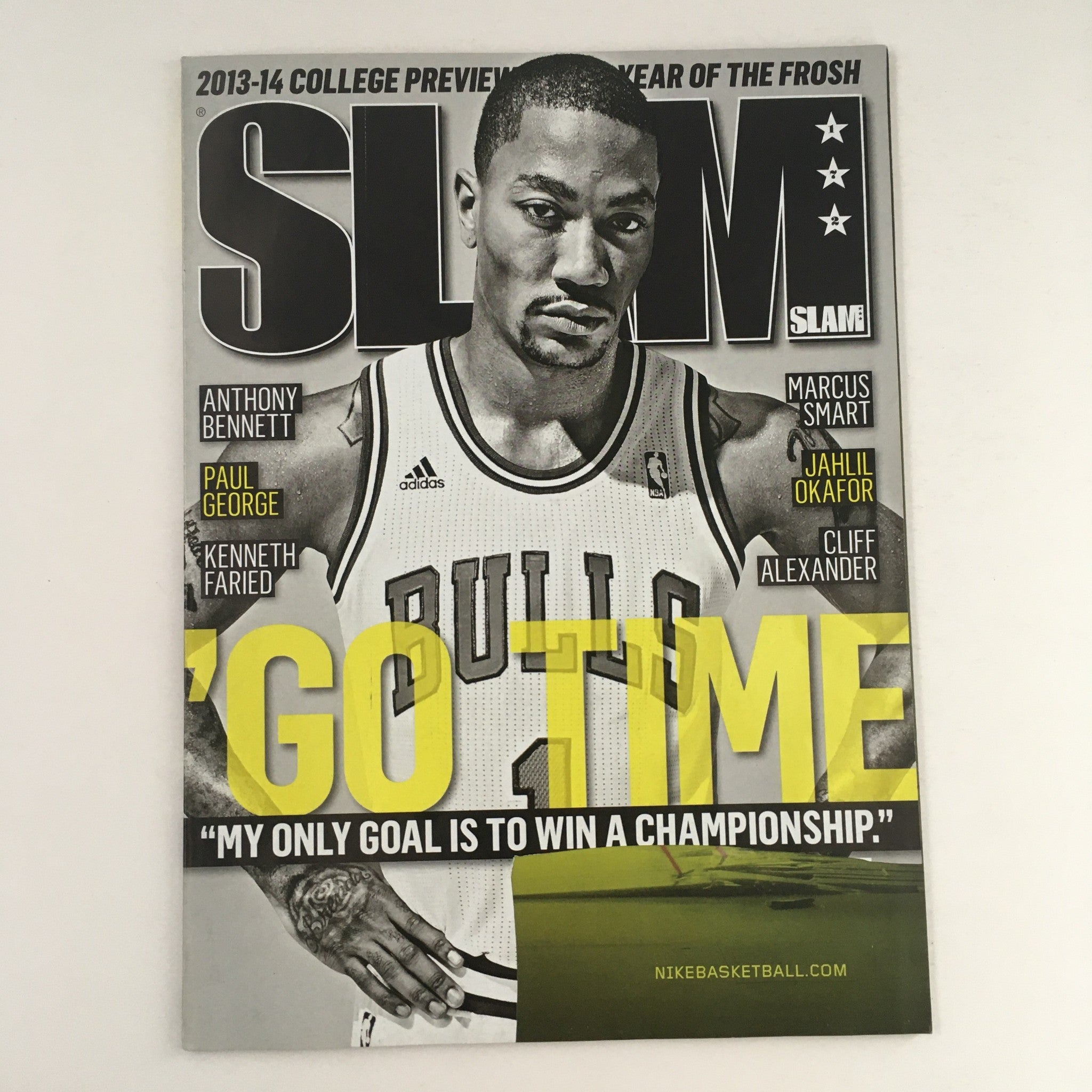 Slam Magazine November 2013 issue cover featuring Derrick Rose, showcasing 'GO TIME' and the tagline about winning a championship.
