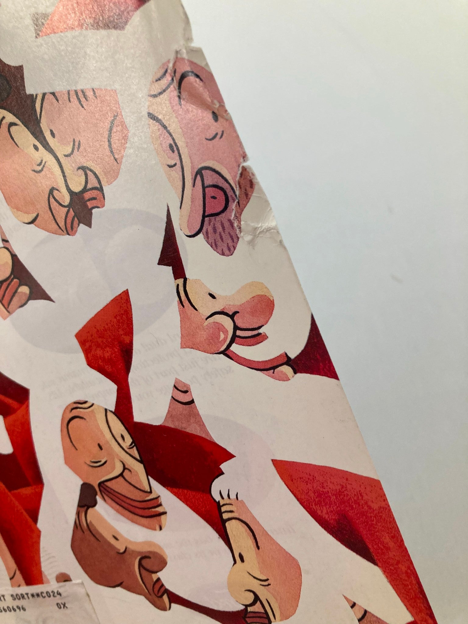 Close-up view of The New Yorker December 18, 1995 cover titled 'Santa City' by Max, showcasing festive Santa illustrations and visible wear.