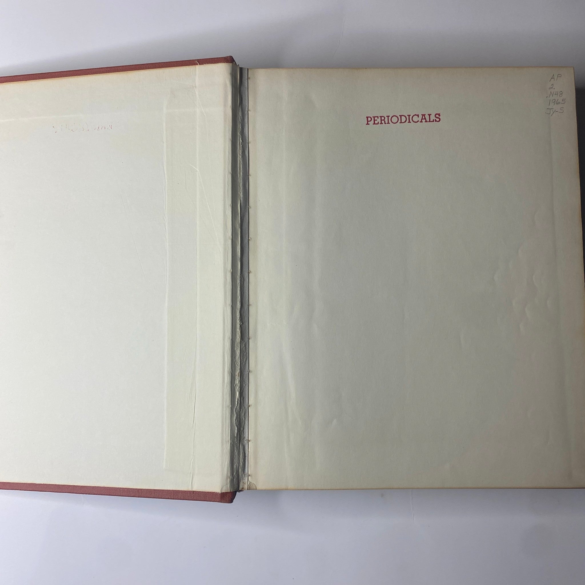 Inside view showcasing the spine of The New York Times Library Edition Bound Magazine 1965 July - September, featuring the title 'PERIODICALS' on the first blank page.