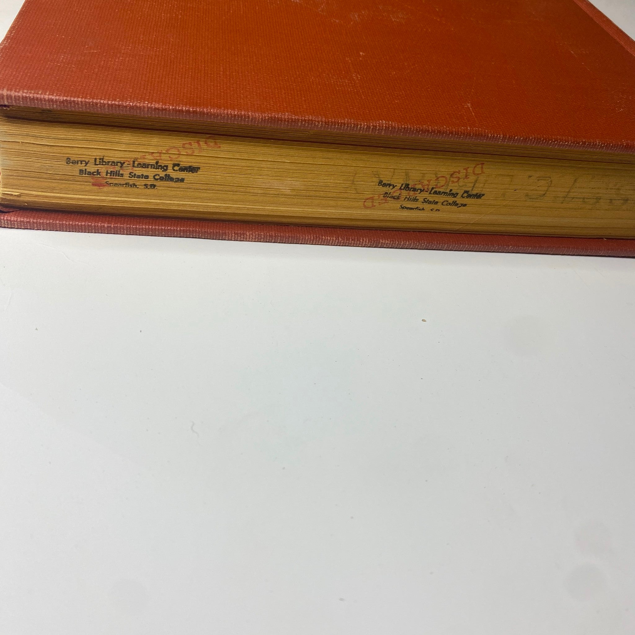 The spine of The New York Times Library Edition Bound Magazine, showing library stamps and identification from Black Hills State College.