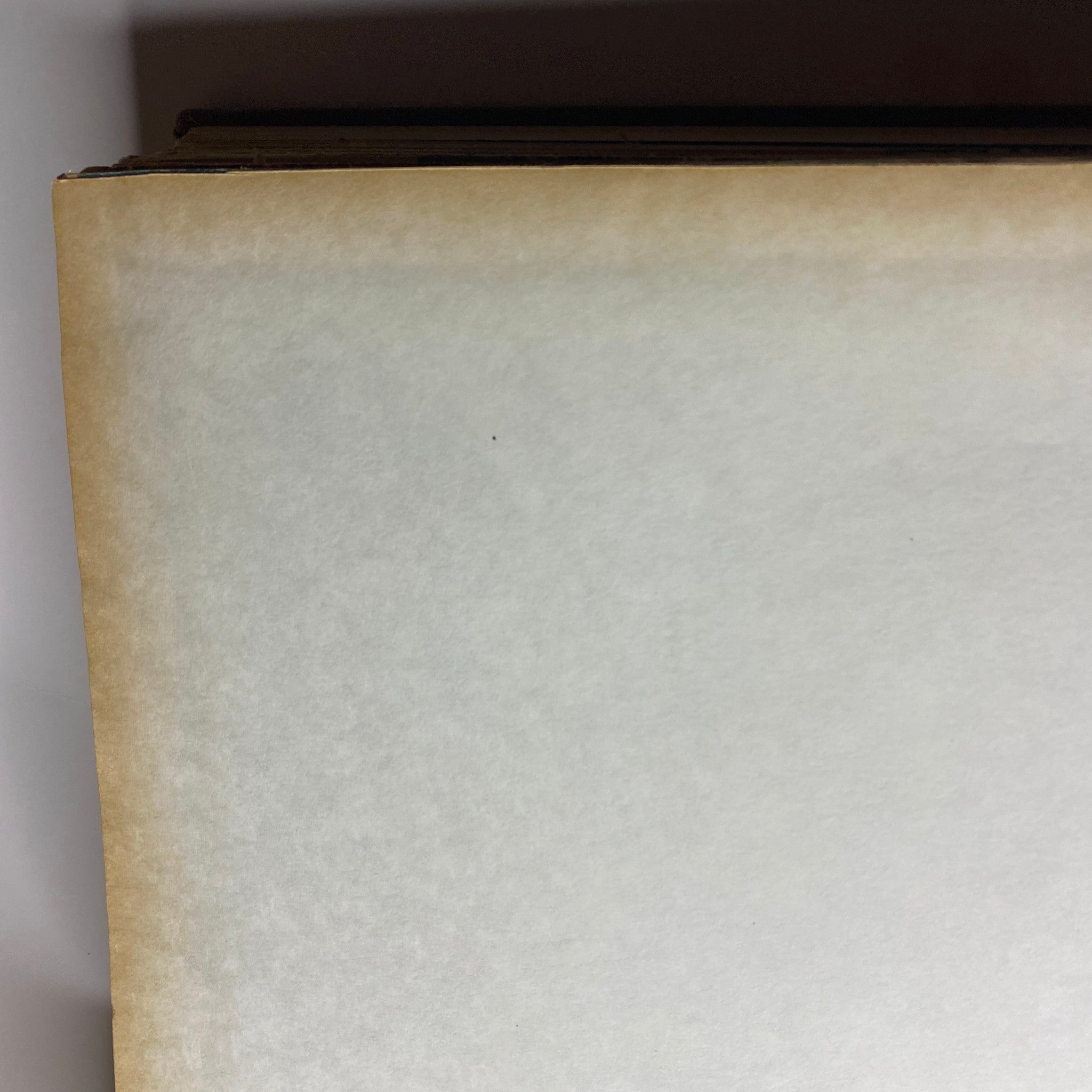 Top view of the spine of 'The New York Times Library Edition Bound Magazine 1968 May - June', showcasing its unique binding and condition.