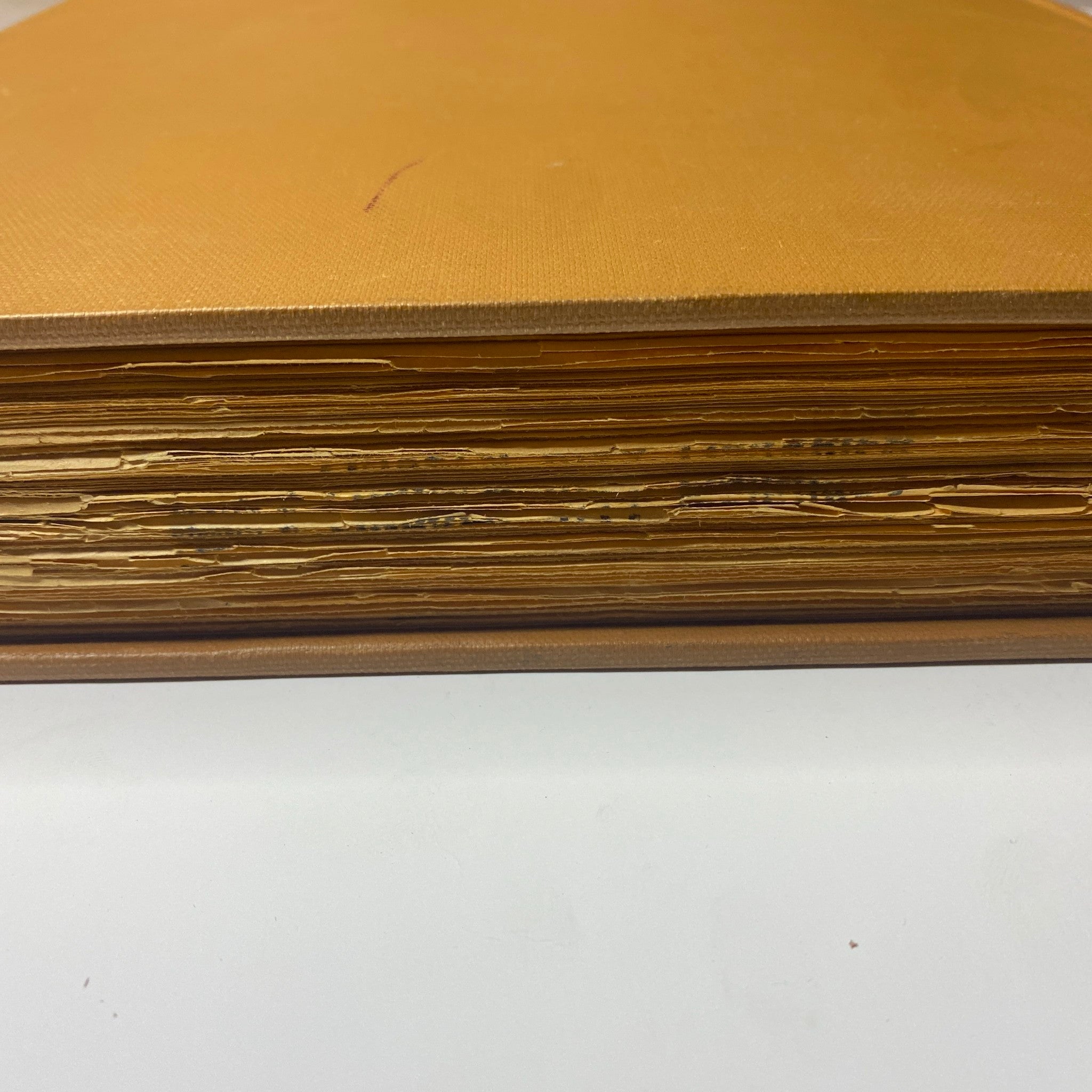Side view of The New York Times Library Edition Bound Magazine 1968, displaying the worn pages and binding.