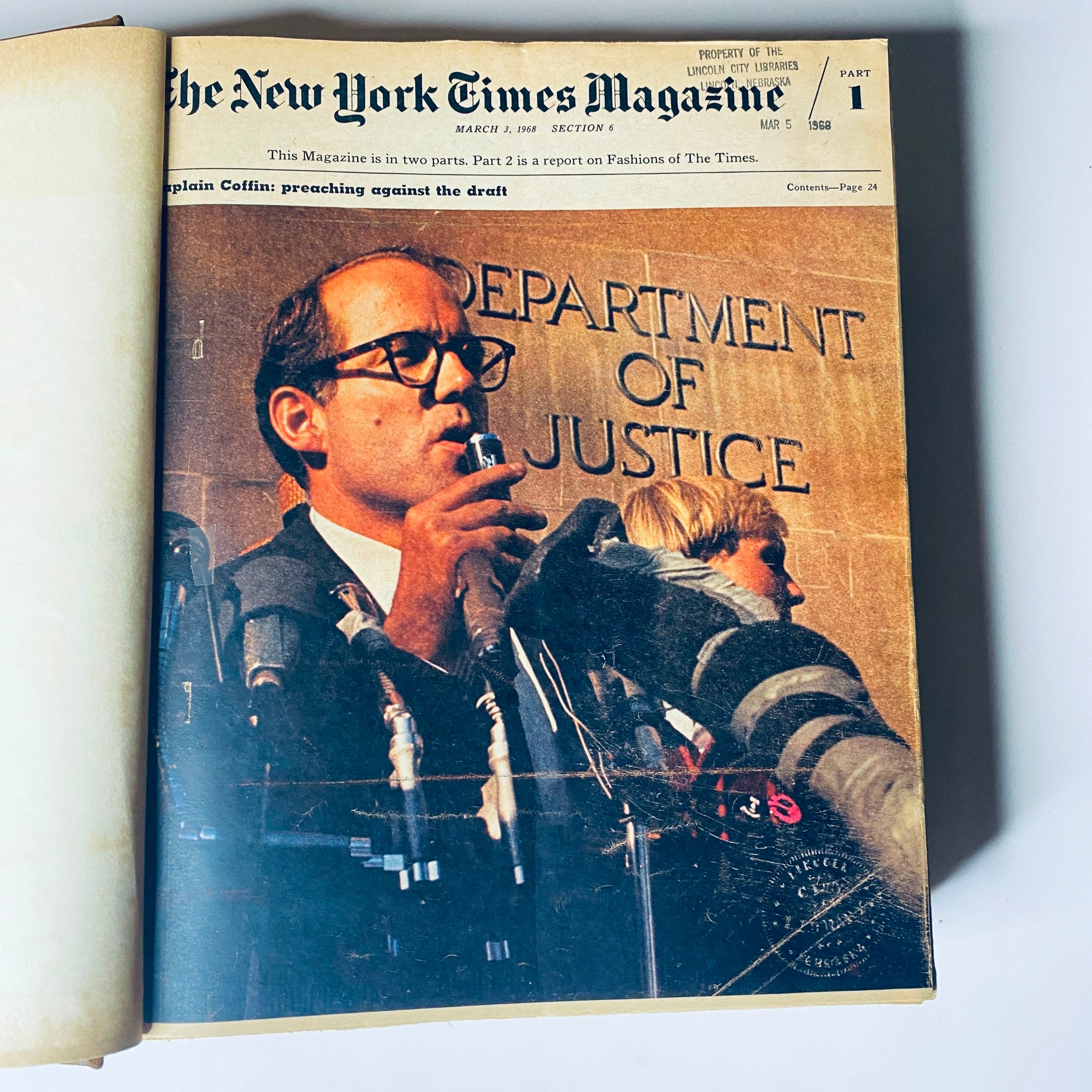 Page showcasing the cover of The New York Times Magazine from March 3, 1968, featuring a photo of a speaker at a podium with 'Department of Justice' backdrop.