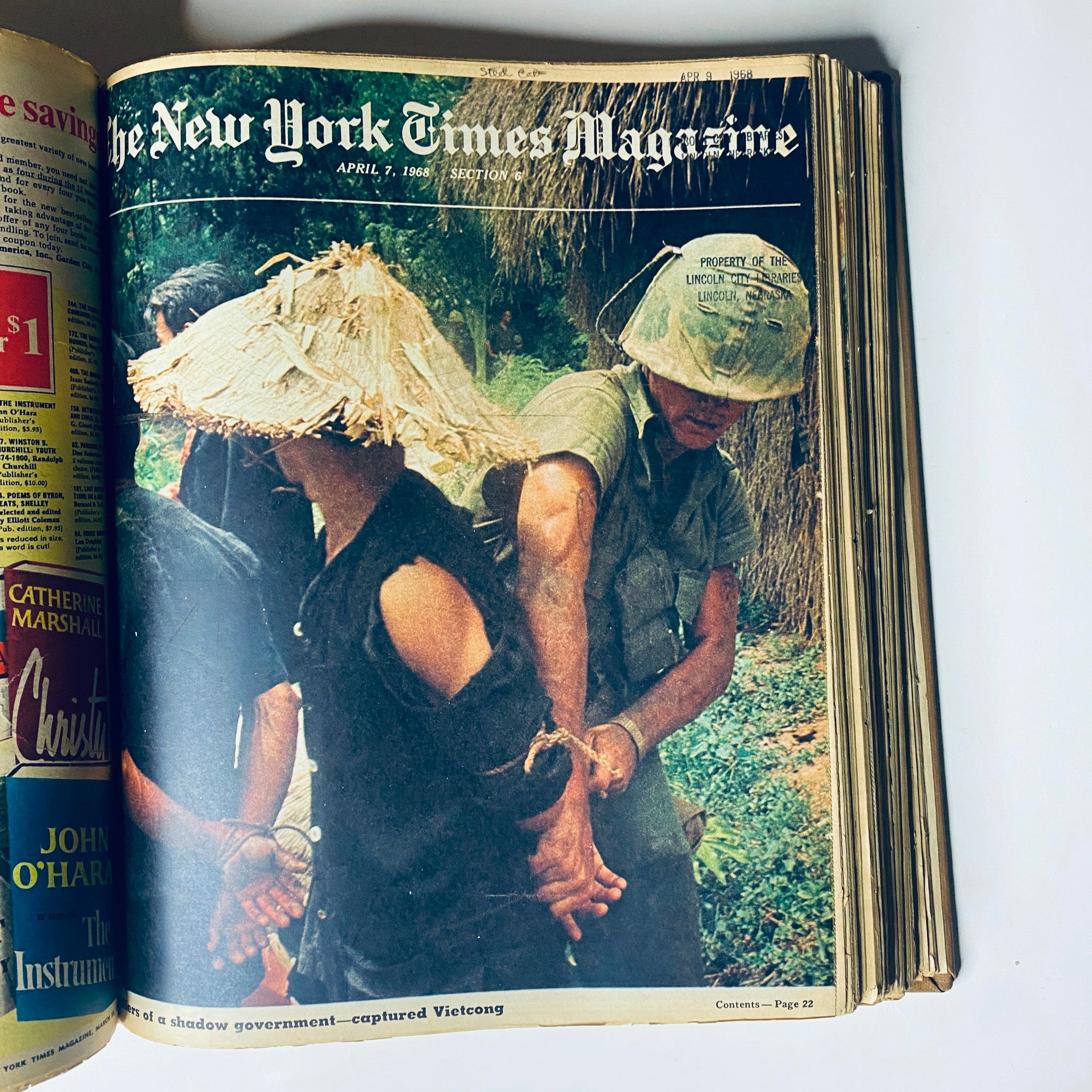 Cover of The New York Times Library Edition Bound Magazine, April 7, 1968, showcasing a compelling image of individuals captured during the Vietnam War, illustrating the era's tumultuous events.