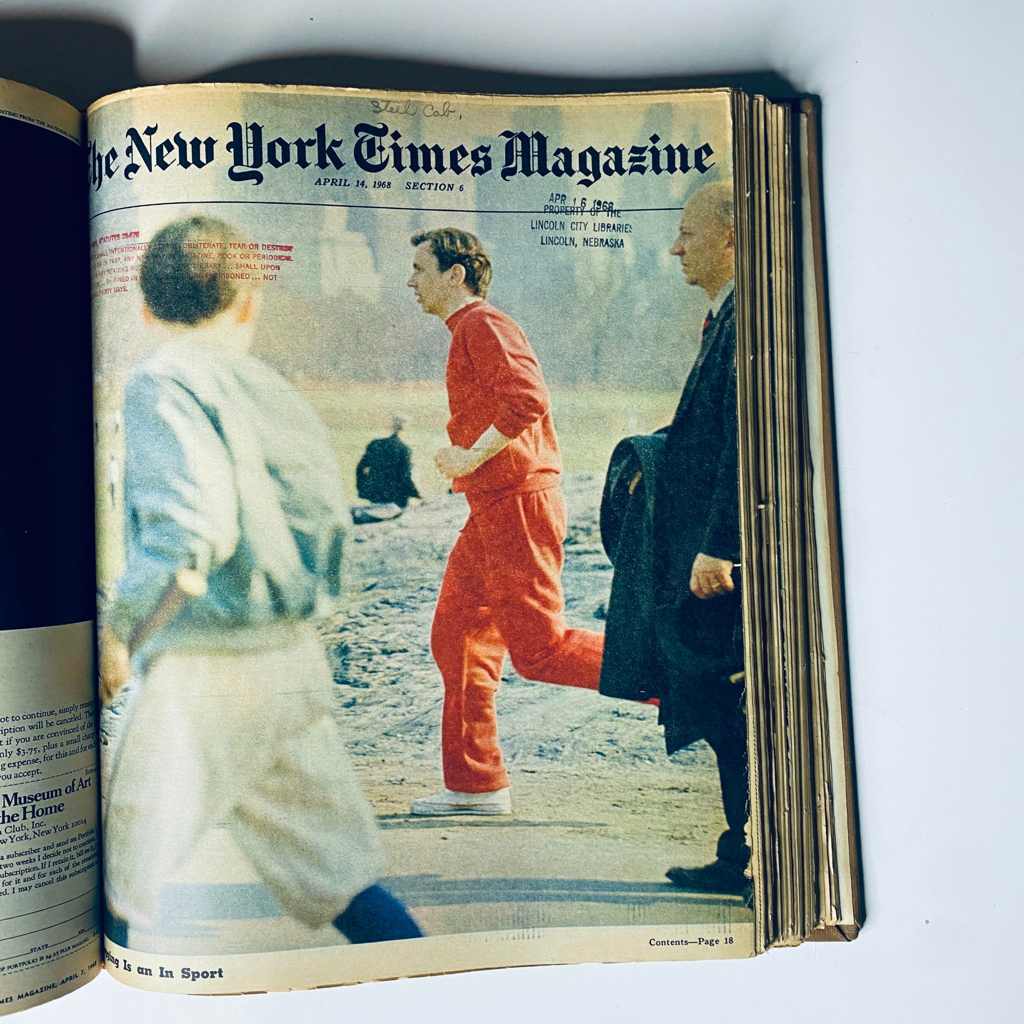 Cover of The New York Times Library Edition Bound Magazine, April 14, 1968, featuring a vibrant image of a runner in a red tracksuit passing by spectators, encapsulating the spirit of athleticism in the '60s.