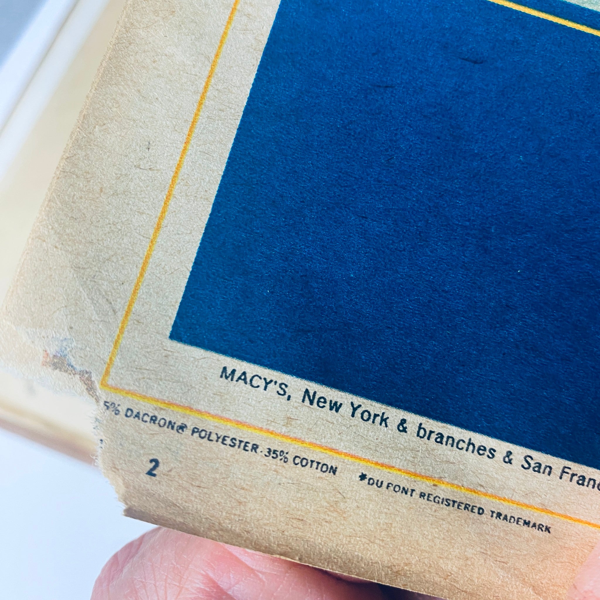 Close-up of the spine of The New York Times Library Edition Bound Magazine July - August 1968, showing details of the publisher and material. An insightful look into historical magazines from a pivotal time in American history.