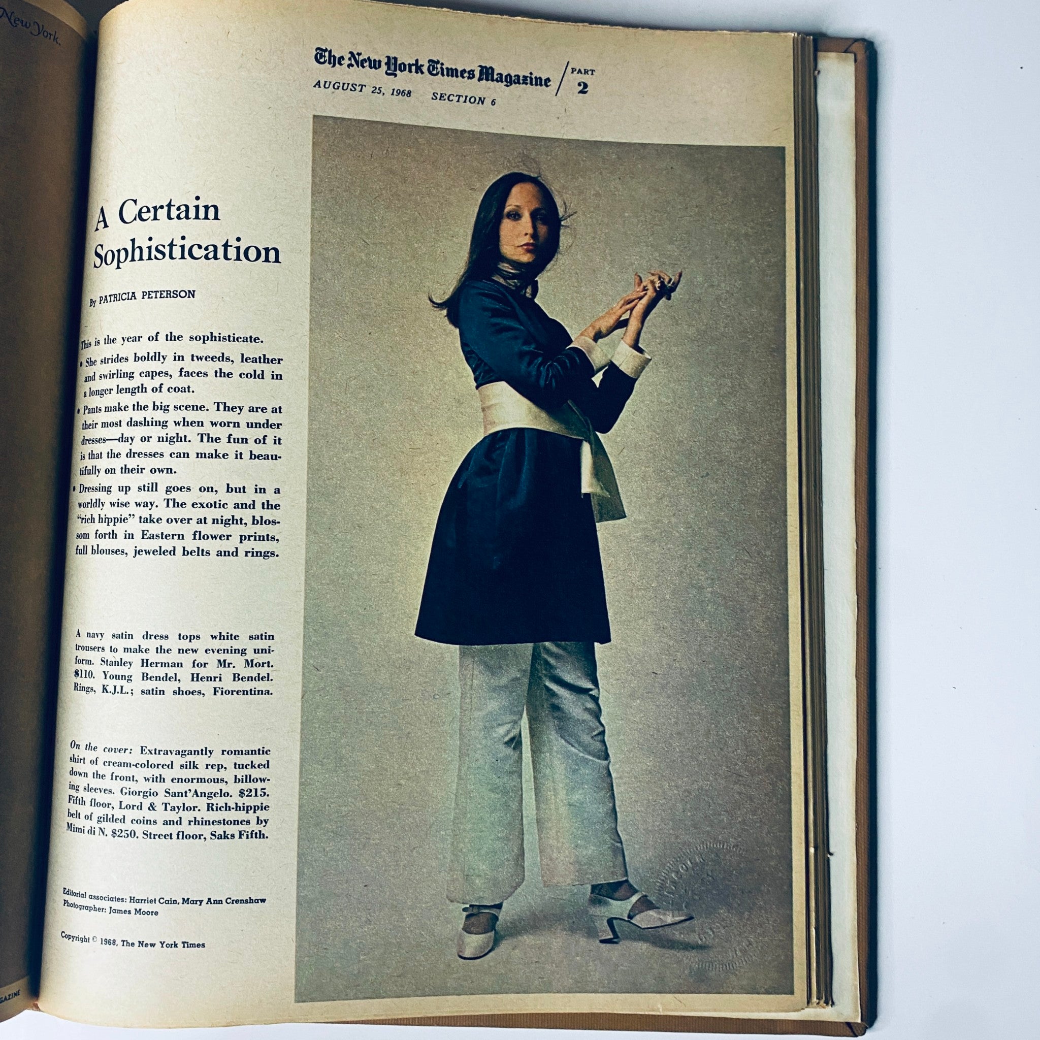 Another fashion spread from The New York Times Library Edition Bound Magazine 1968 July - August, depicting a model in a sophisticated outfit, emphasizing the iconic styles of the late 1960s.