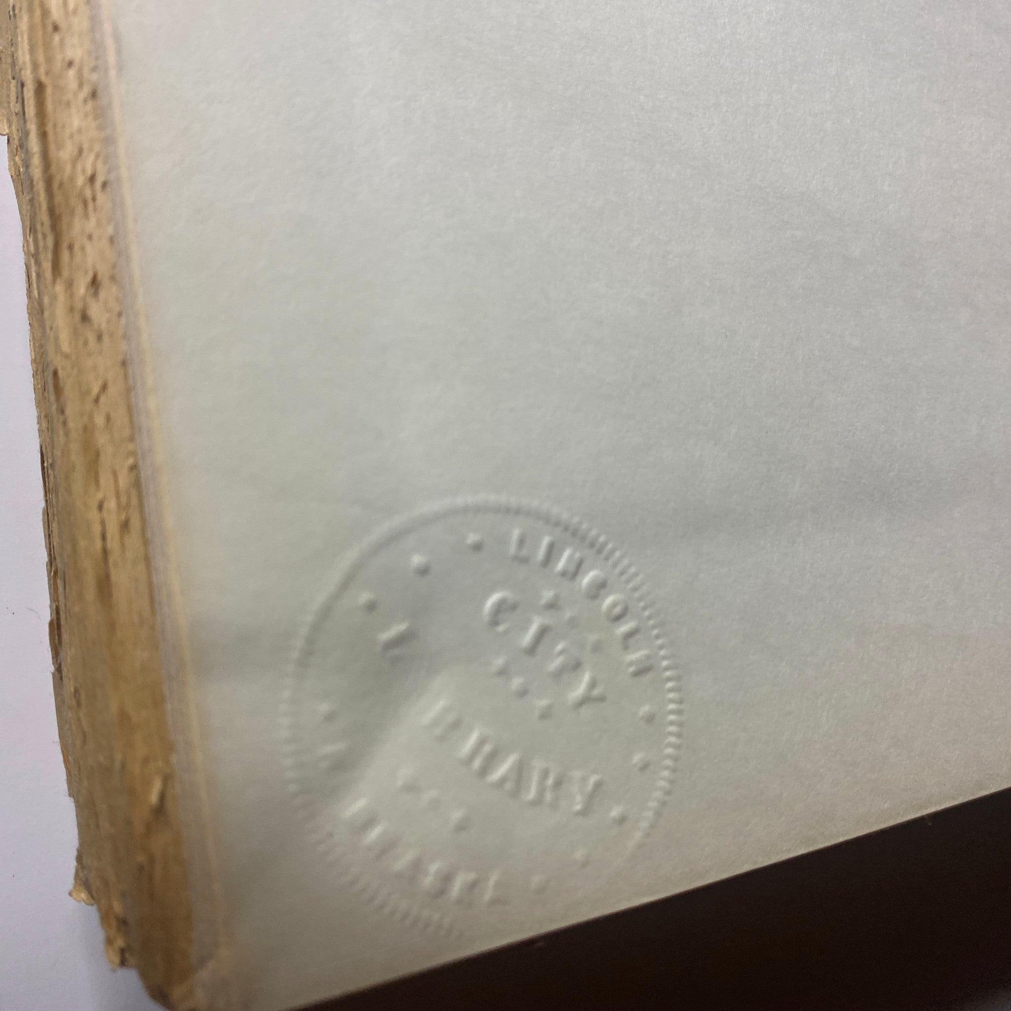 The embossed stamp on the pages of The New York Times Library Bound Magazine 1968 November - December, indicating it's from Lincoln City Library.