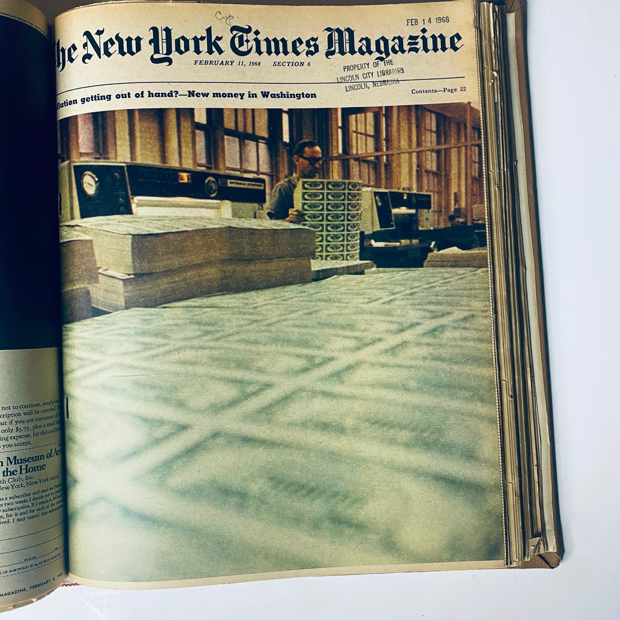 Cover of The New York Times Magazine February 11, 1968, capturing an image of a man organizing stacks of printed bills in a historical context, representing monetary issues in Washington.