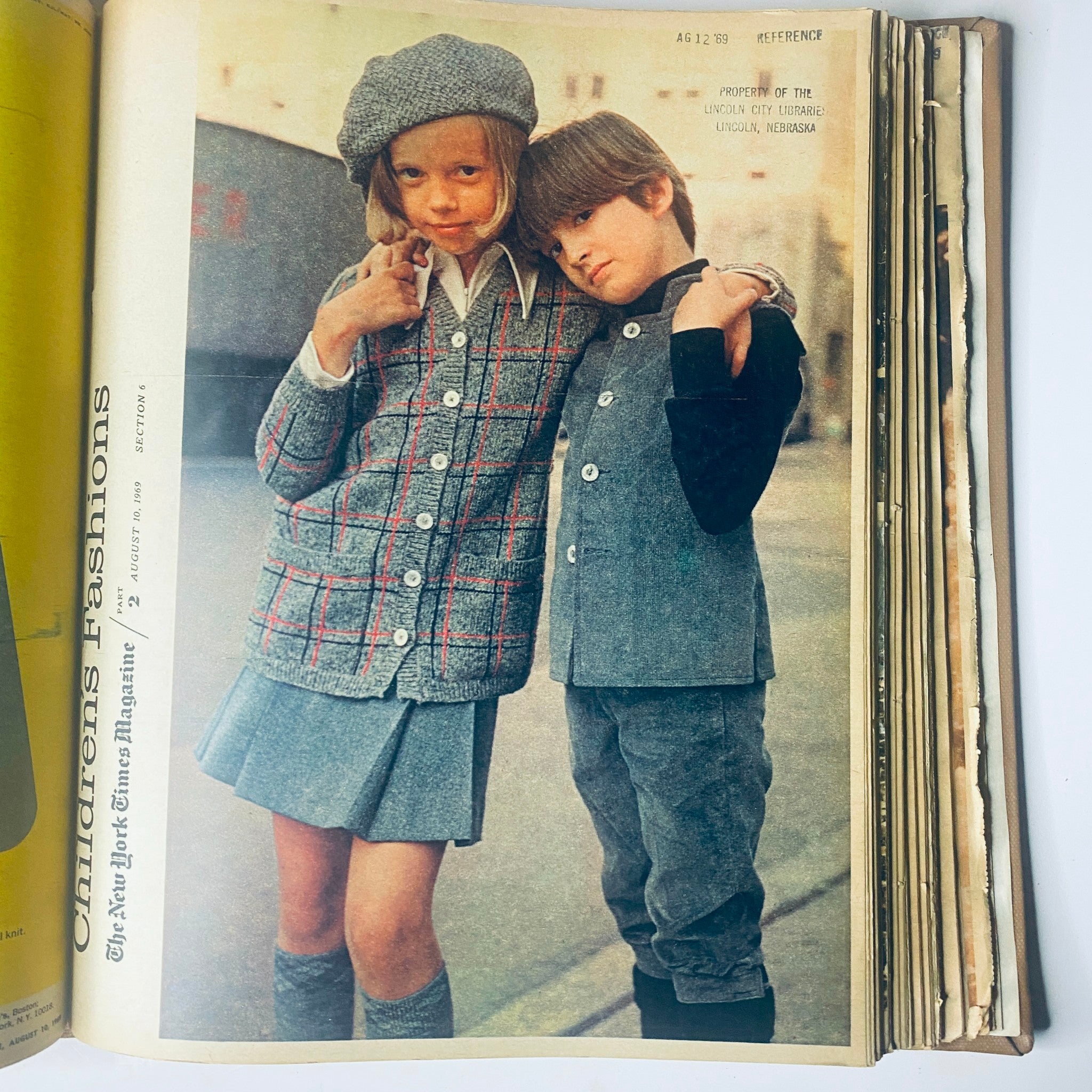 Cover of The New York Times Magazine, August 17, 1969, featuring two children posing in stylish outfits, representing popular fashion trends of the era.