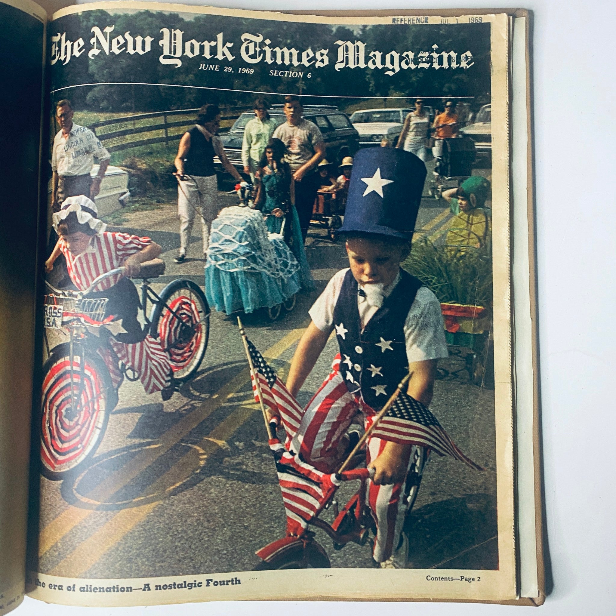 Cover of The New York Times Magazine dated June 29, 1969, featuring a parade scene with children in patriotic attire and decorations celebrating Independence Day.