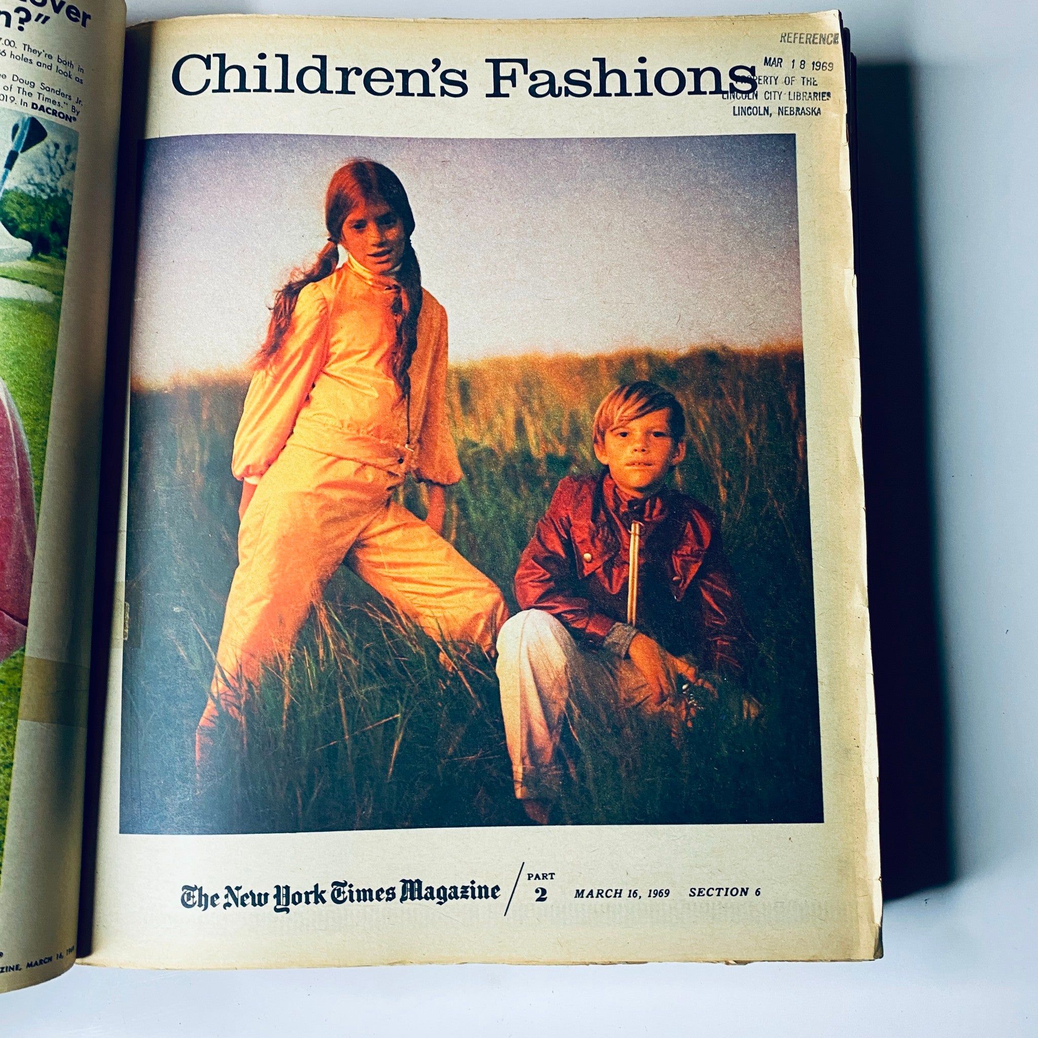 The New York Times Bound Magazine 1969 March - April cover highlighting children’s fashion with portraits of kids in stylish outfits, representative of fashion trends during that time.
