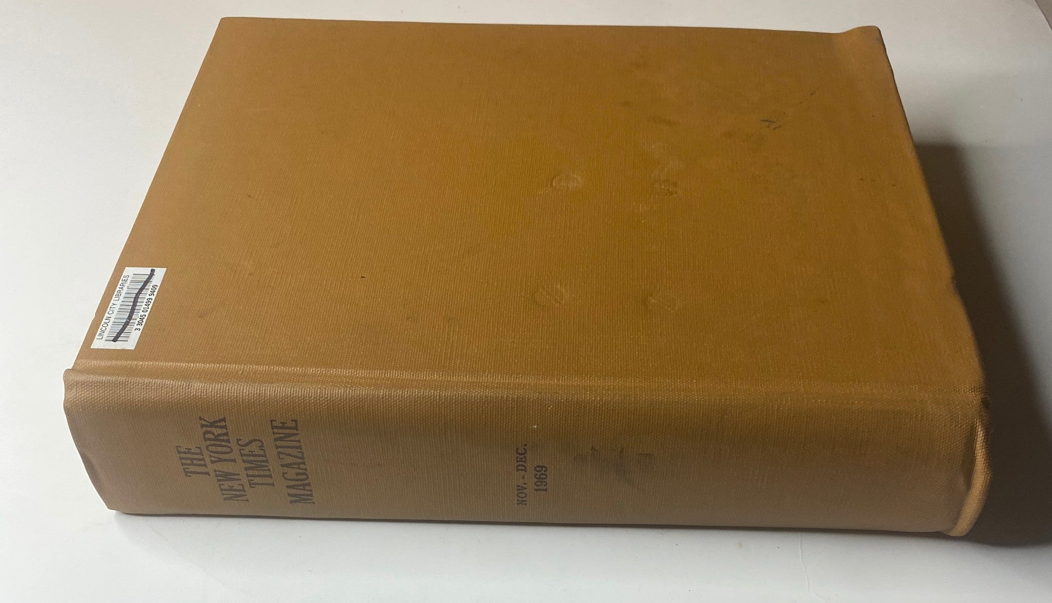 Spine view of The New York Times Bound Magazine November - December 1969 displaying the title and publication dates.