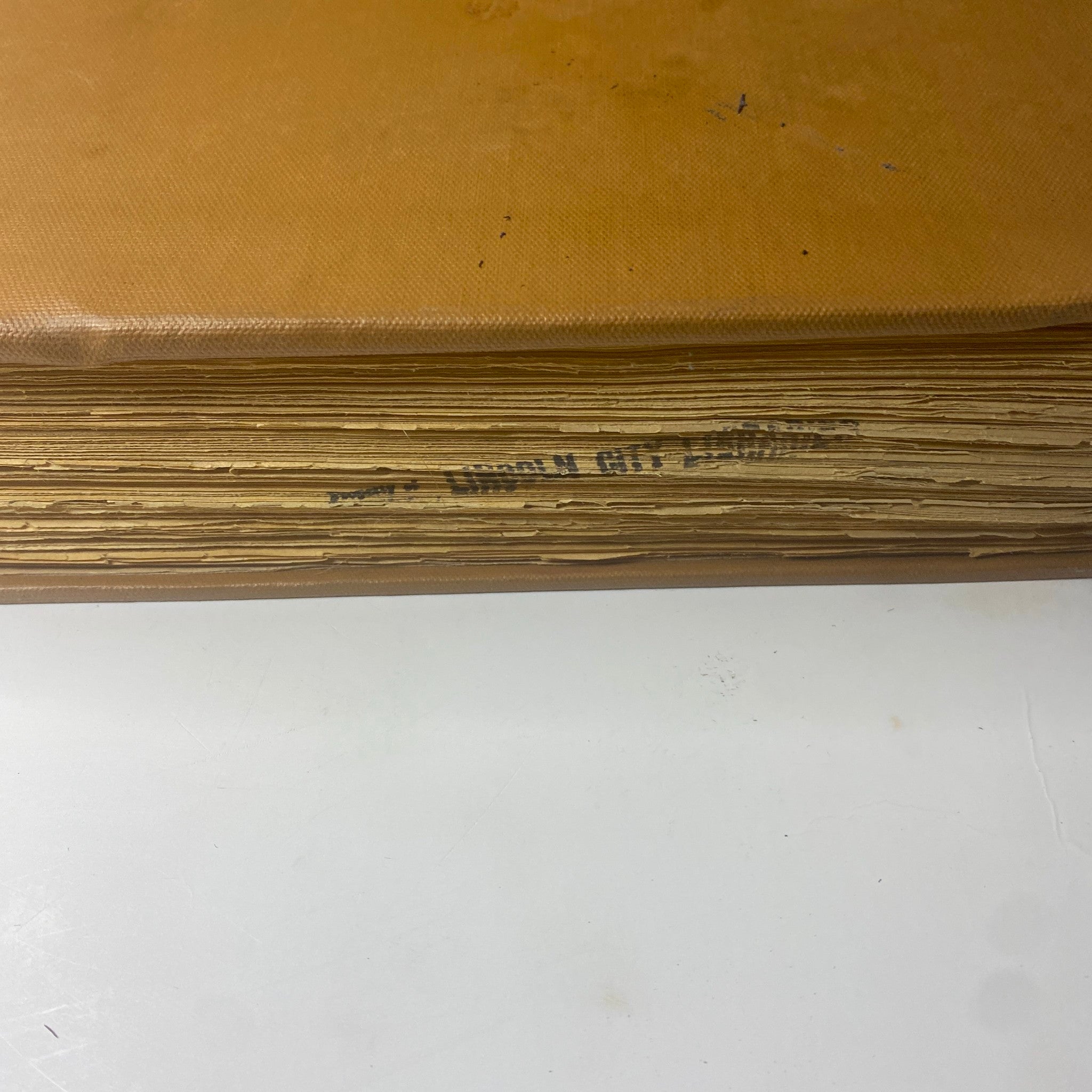 Close-up view of the spine of The New York Times Bound Magazine 1969 November - December, showing the binding and stamped property details.