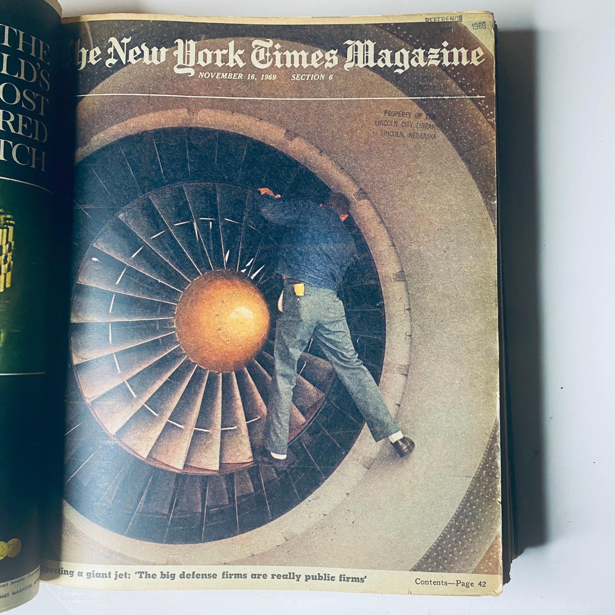 Cover of The New York Times Magazine dated November 16, 1969, depicting a mechanic inspecting a giant jet engine.