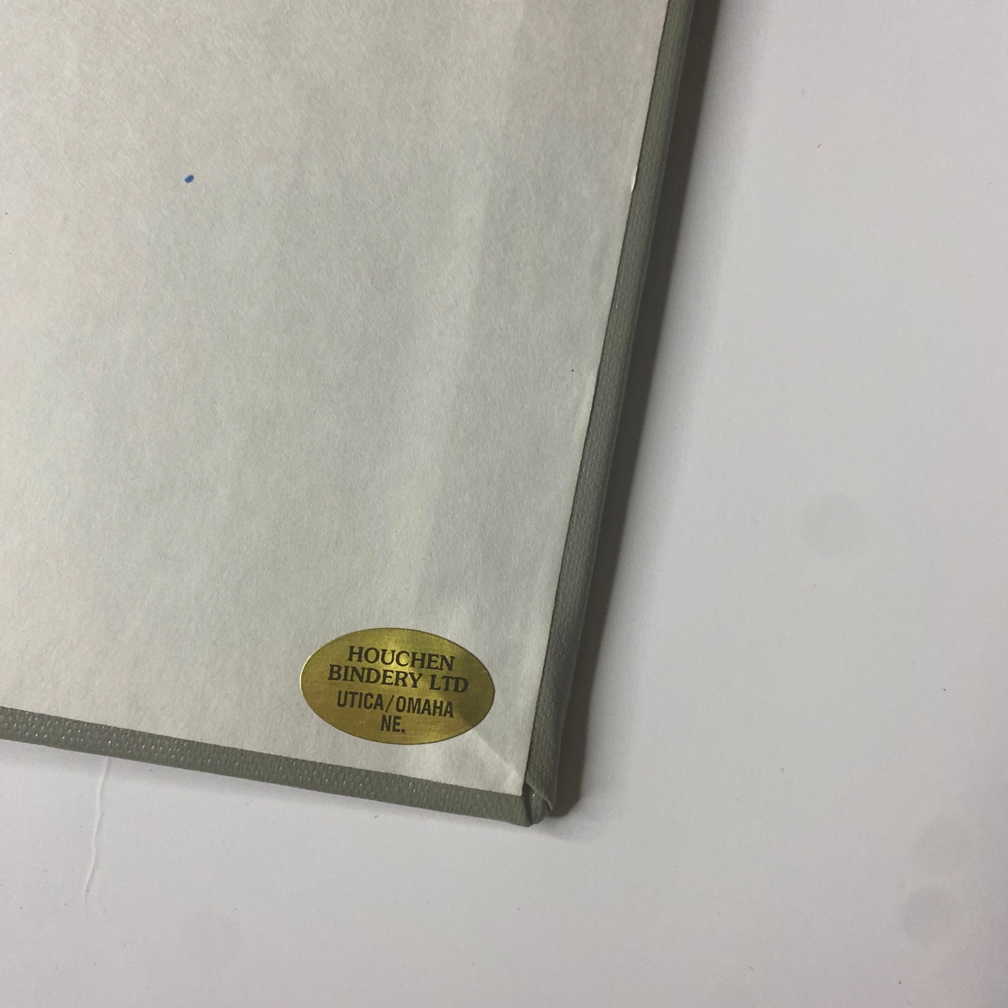 Image of the back cover of The New York Times Library Edition Bound Magazine featuring the label of Houchen Bindery Ltd from Utica/Omaha, Nebraska.