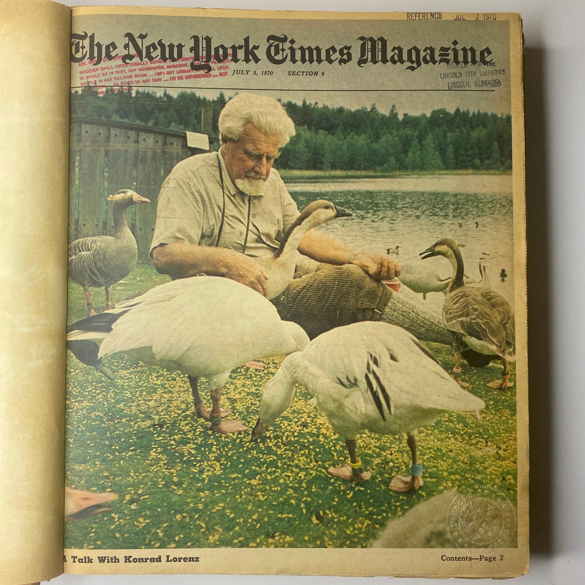 Open page of The New York Times Library Bound Magazine July 5, 1970, featuring an image of a man feeding geese, showcasing the unique article content.