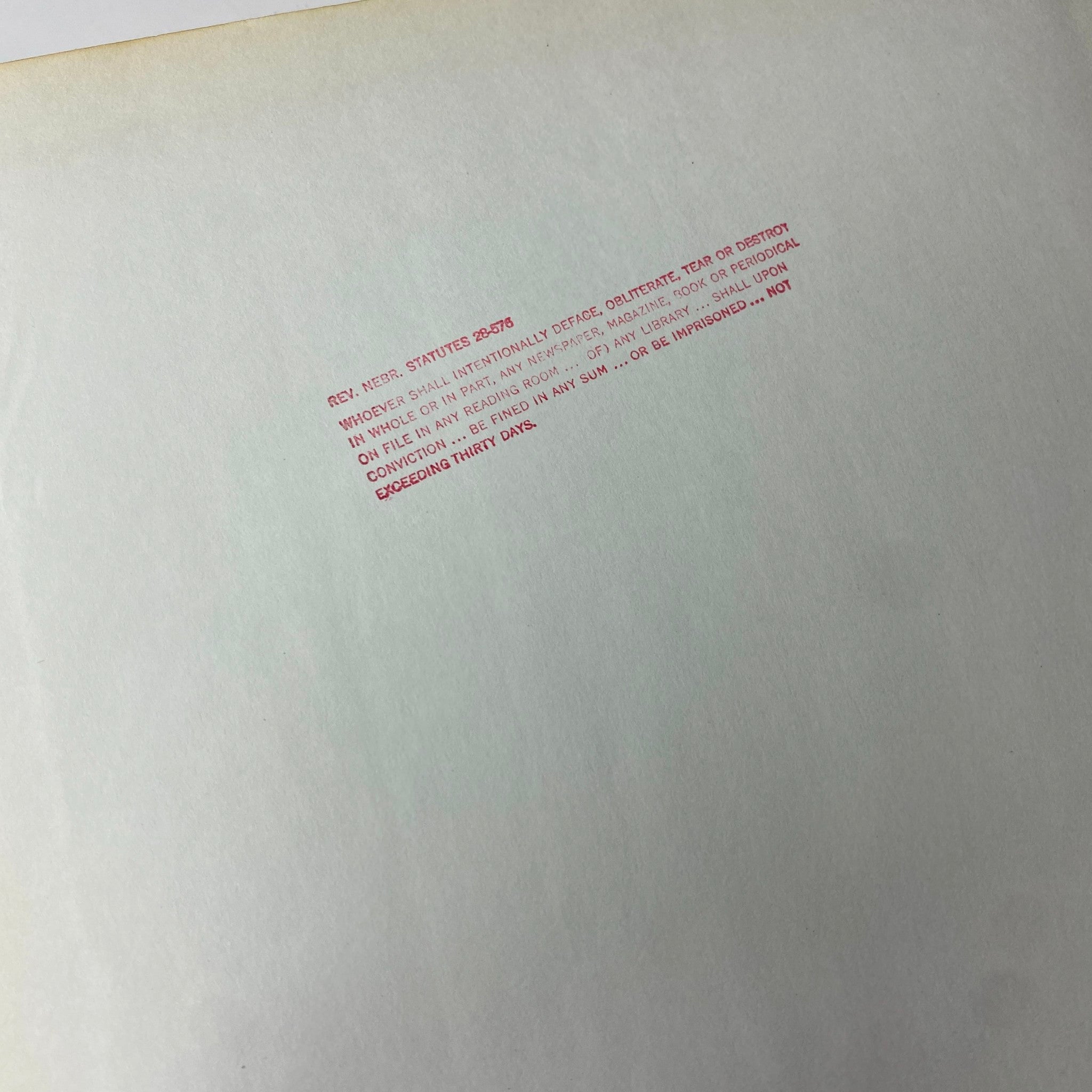 Back cover of The New York Times Library Edition Bound Magazine from March to April 1971, displaying library usage information in red ink.