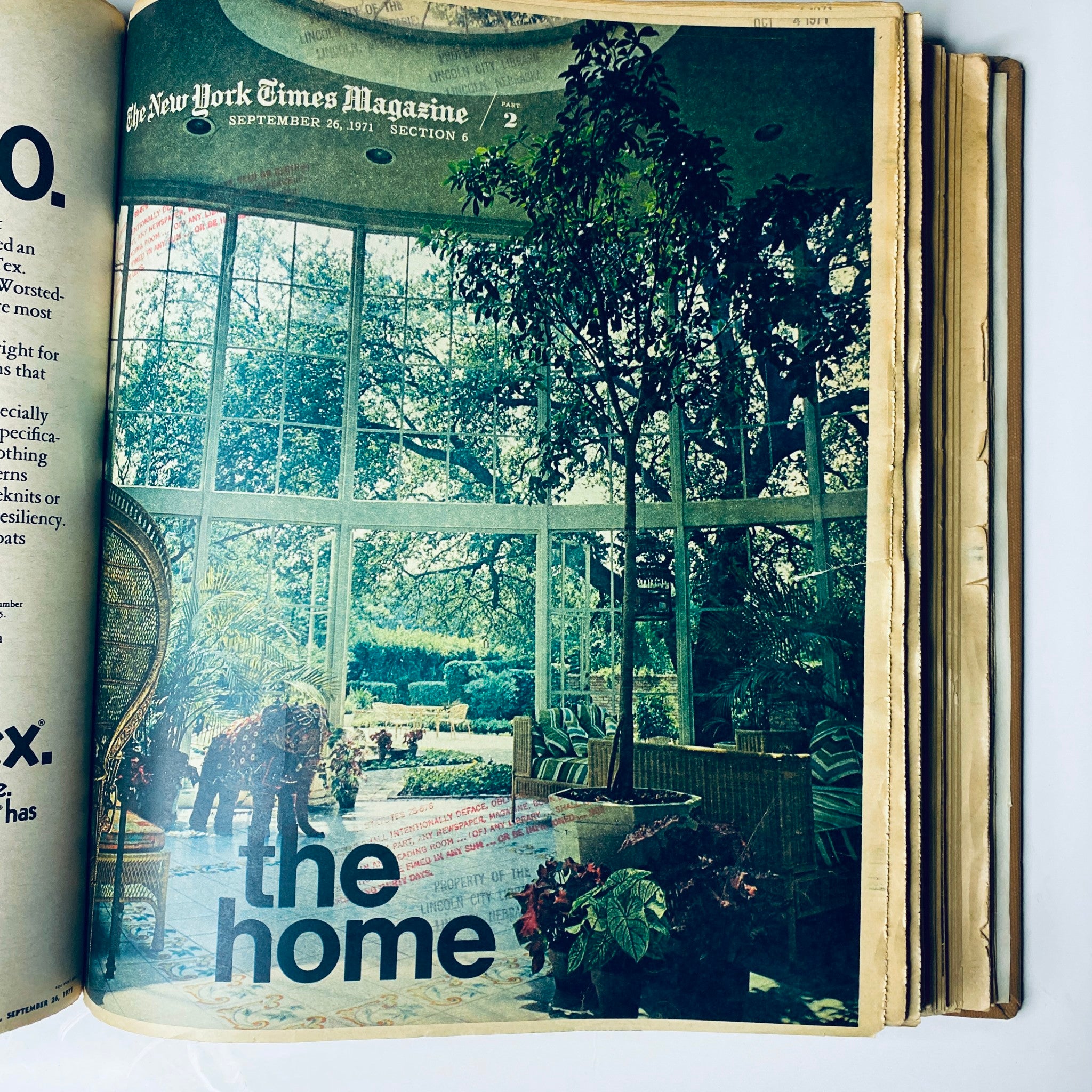 The New York Times Library Edition Bound Magazine 1971 September - October showcasing an elegant interior garden scene titled 'the home'. The image captures a sunlit room filled with trees and plants.