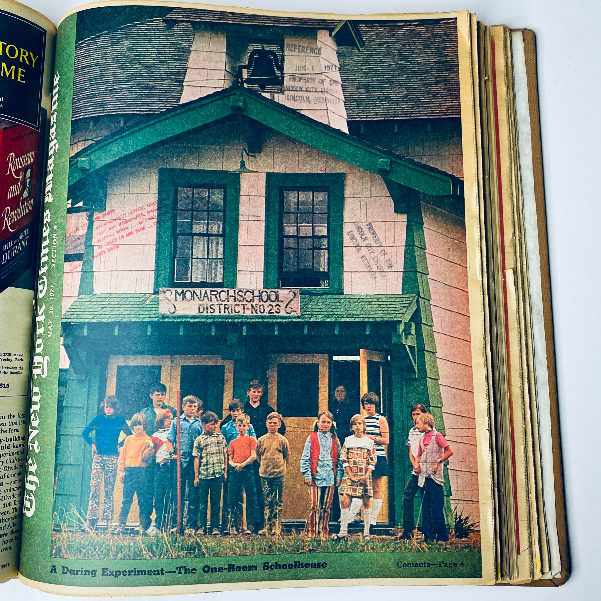 The New York Times Library Edition Bound Magazine from May to June 1971 showing a group of children standing in front of the Monarch School, District No. 23.