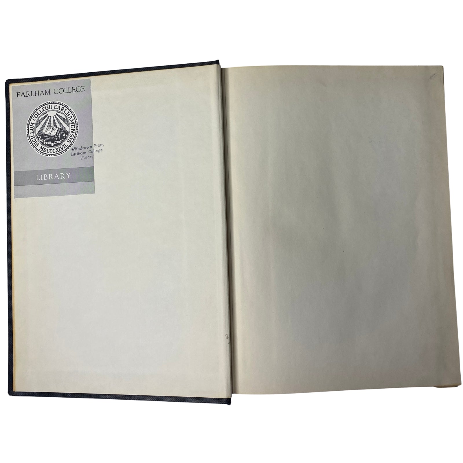 Inside view of the bound Time Magazine, showing the Earlham College Library stamp, indicating its provenance and authenticity.