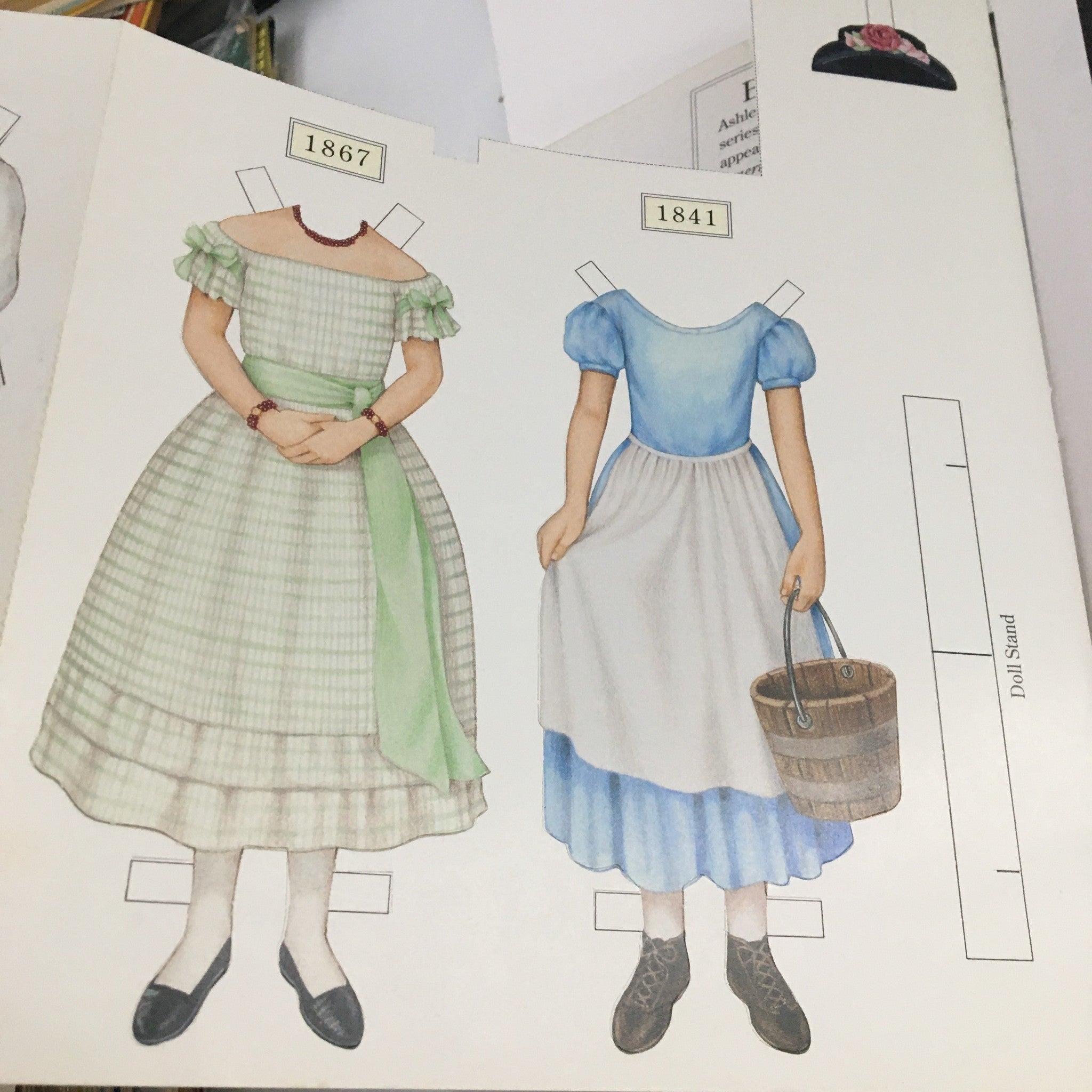 American Girl Magazine January 1995 features historical paper dolls representing fashions from 1867 and 1841.