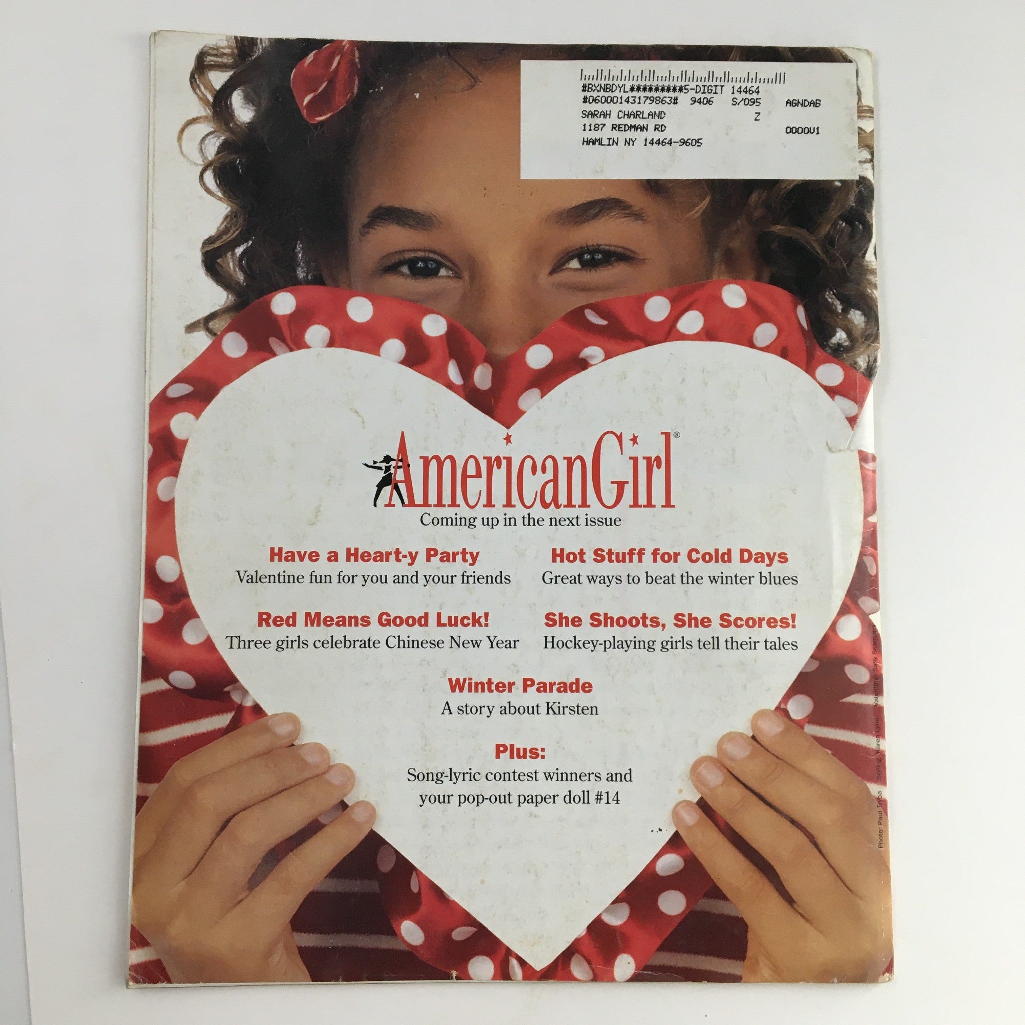 Back cover of American Girl Magazine November 1994, showcasing upcoming features and highlights, including a Valentine's theme and a story about Kirsten.