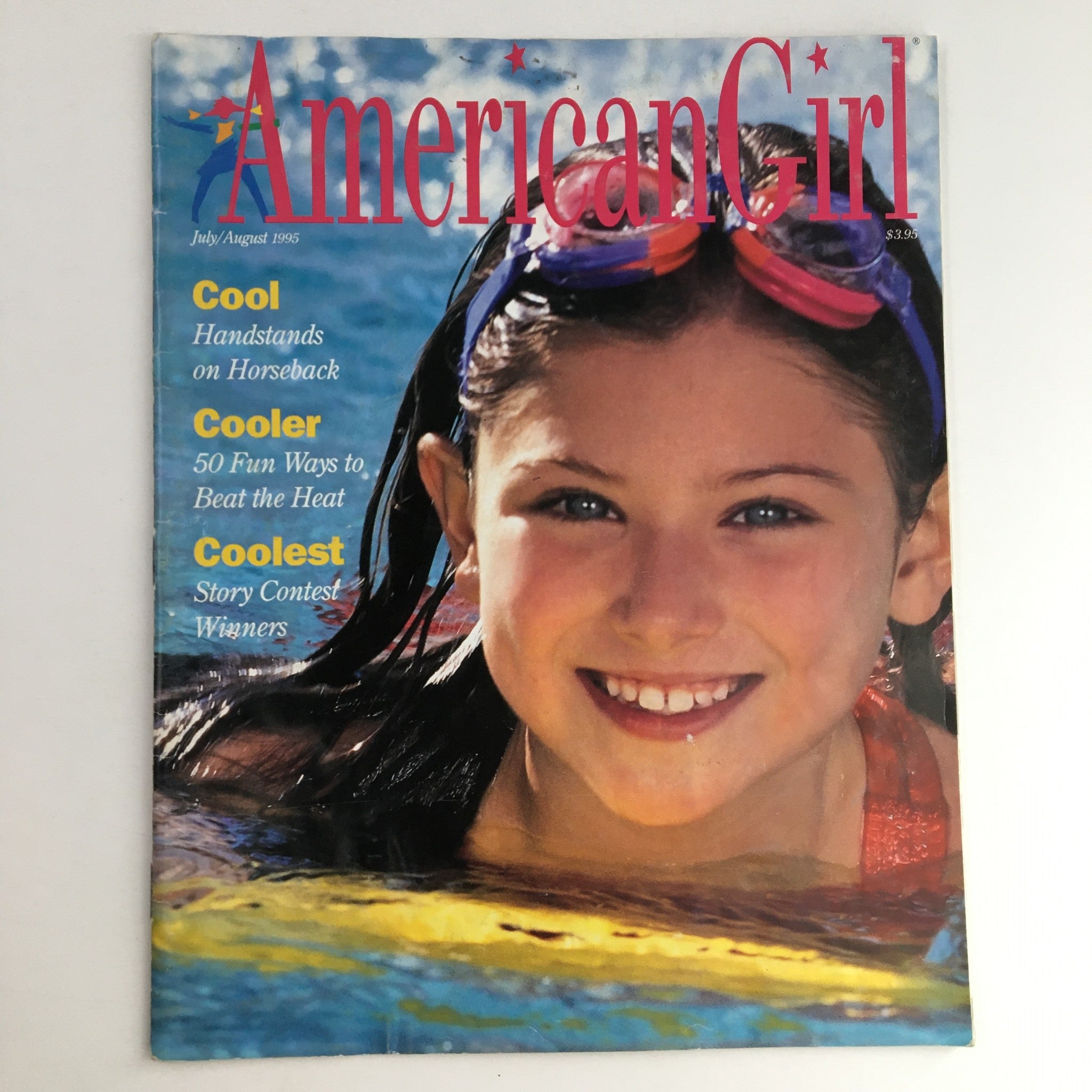 American Girl Magazine July 1995 cover featuring a girl smiling with swimming goggles, showcasing the theme of 'Cool Handstands on Horseback, No Cutouts'.