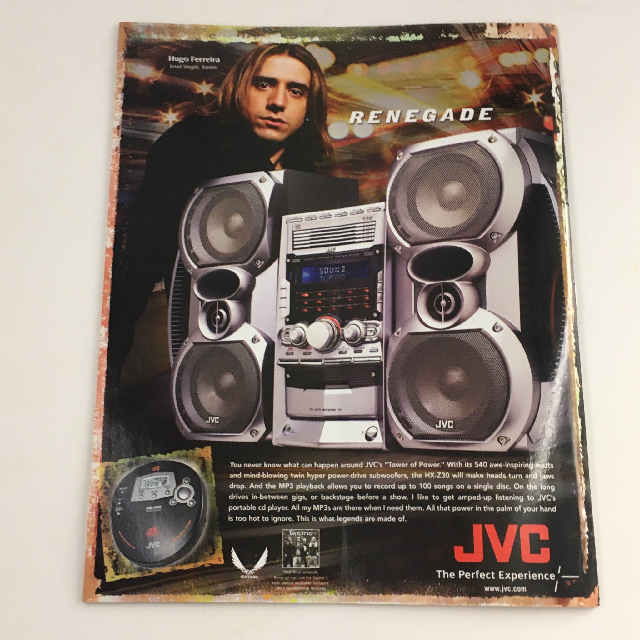 WWE Raw Magazine January 2004 includes an advertisement for JVC audio equipment, blending pop culture with wrestling themes.