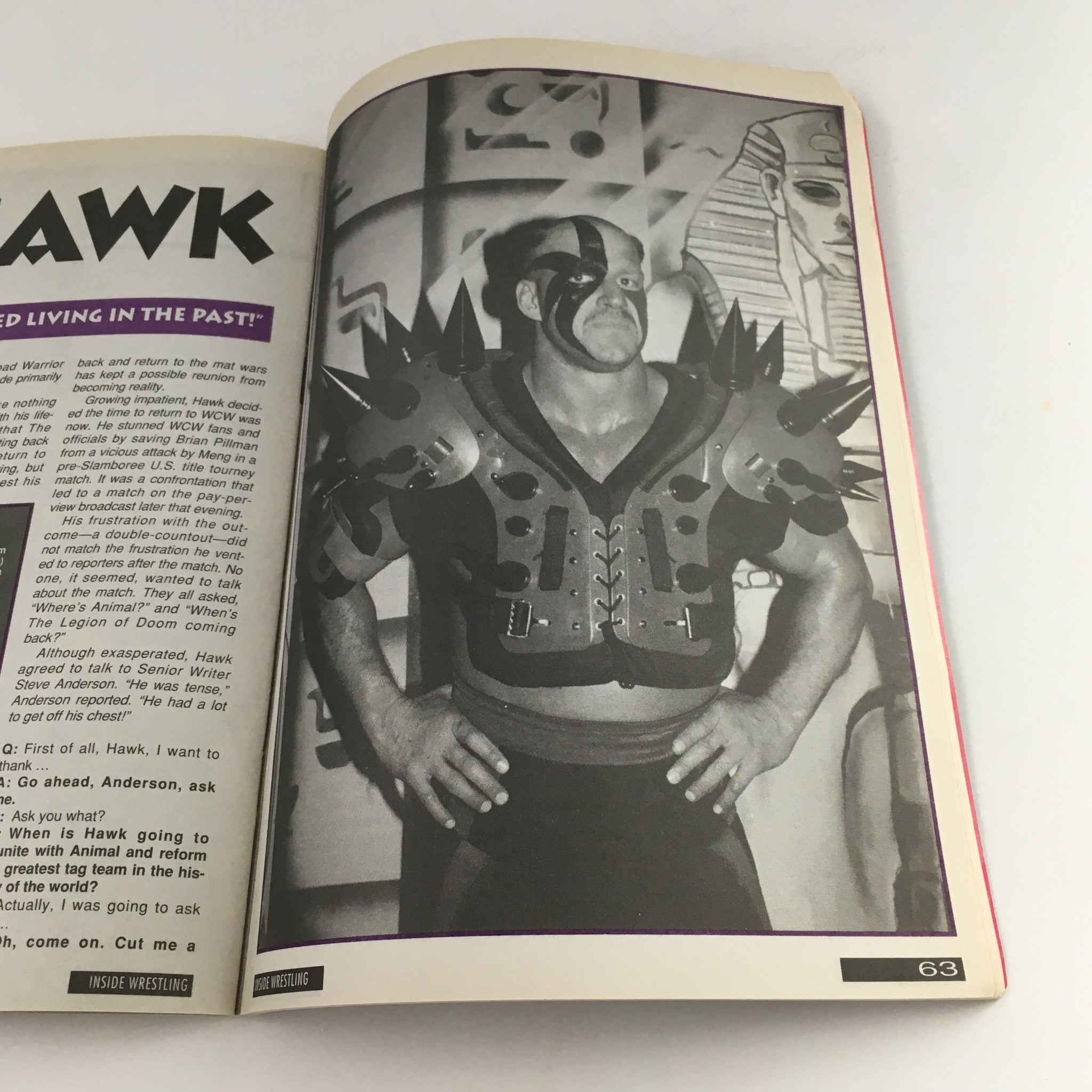 Image of Hawk from Inside Wrestling Magazine, October 1995, displaying his signature spiked shoulder pads and wrestling character, with insightful commentary.