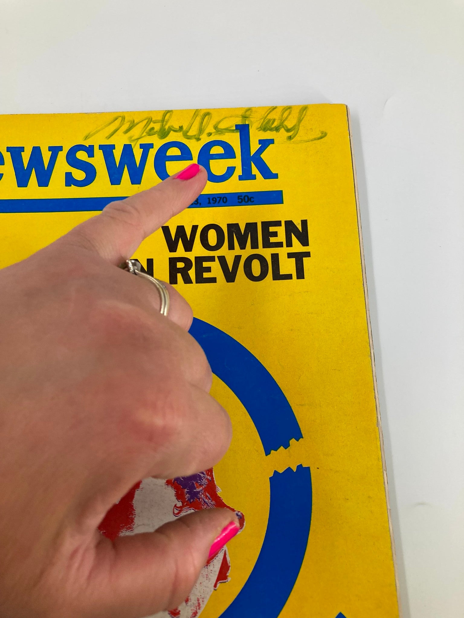 Close-up of the VTG Newsweek Magazine from March 23 1970, highlighting the title 'Women in Revolt' and a handwritten signature on the cover.