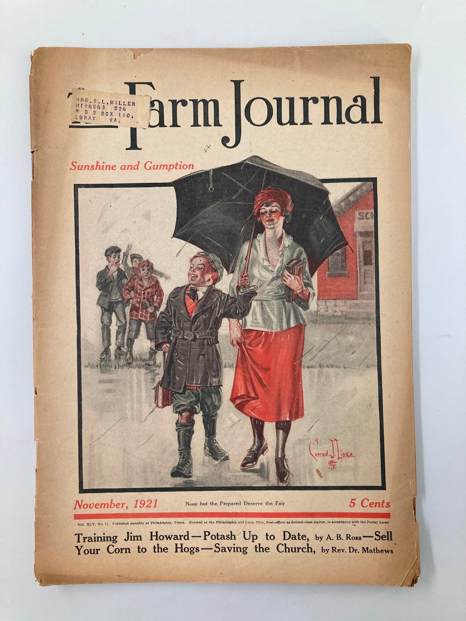 Cover of The Farm Journal magazine, November 1921 edition featuring the title 'Training Jim Howard for Leadership' with an illustration of a well-dressed woman holding an umbrella standing next to a boy in a coat. This vintage magazine offers insights into agricultural practices and cultural dynamics of the early 20th century.