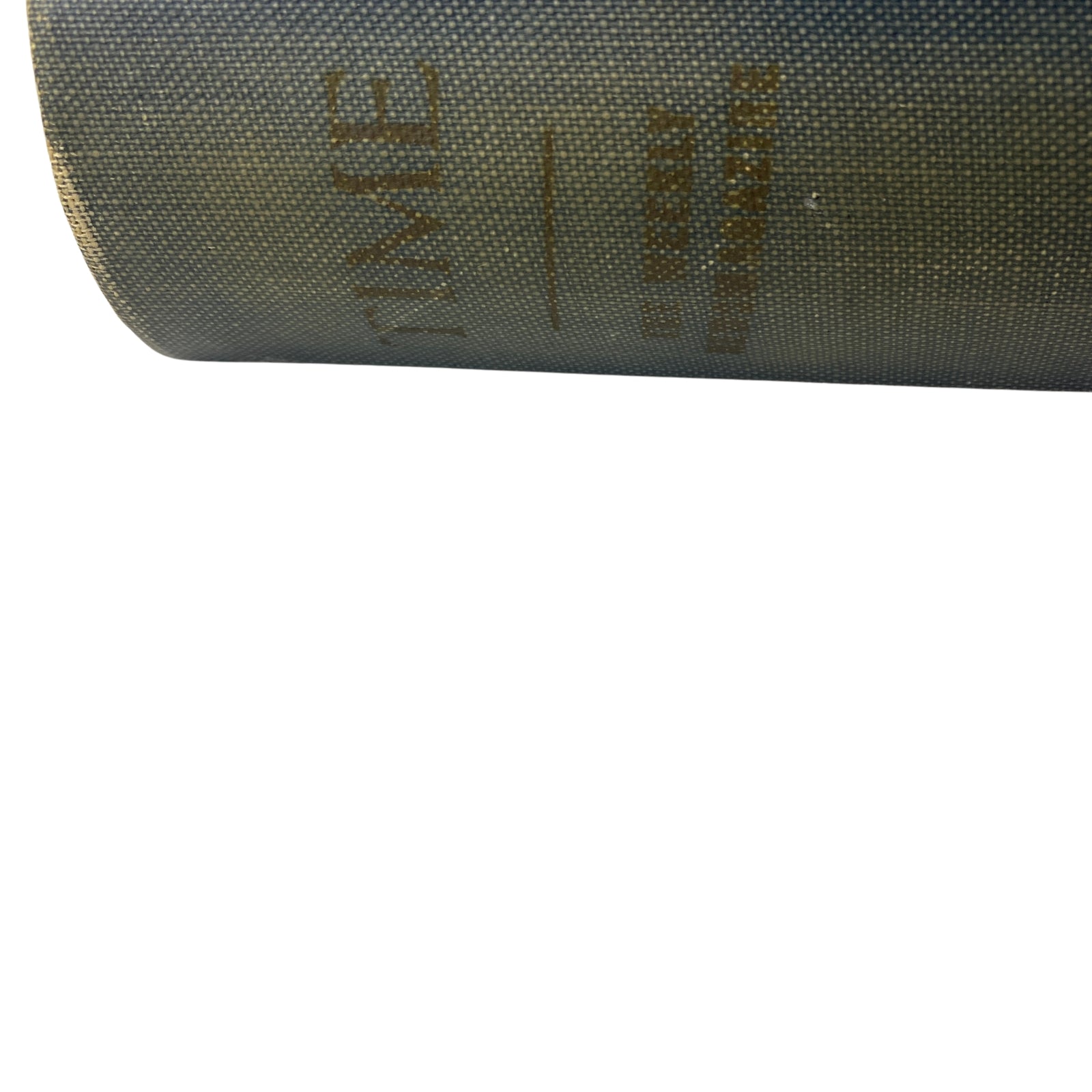 Close-up of the spine of the Time Magazine Bound Weekly volume for January to June 1926, detailing the title and year. Ideal for library archives or historical enthusiasts.