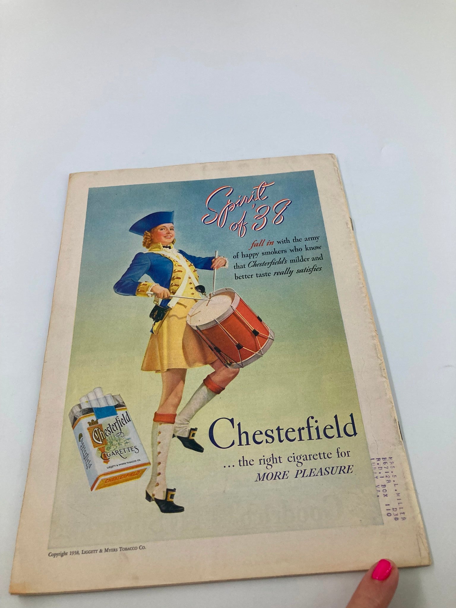 Cover of VTG Farm Journal Magazine from July 1938 featuring an illustration of a drummer girl promoting Chesterfield cigarettes, showcasing vintage advertising and historical design.