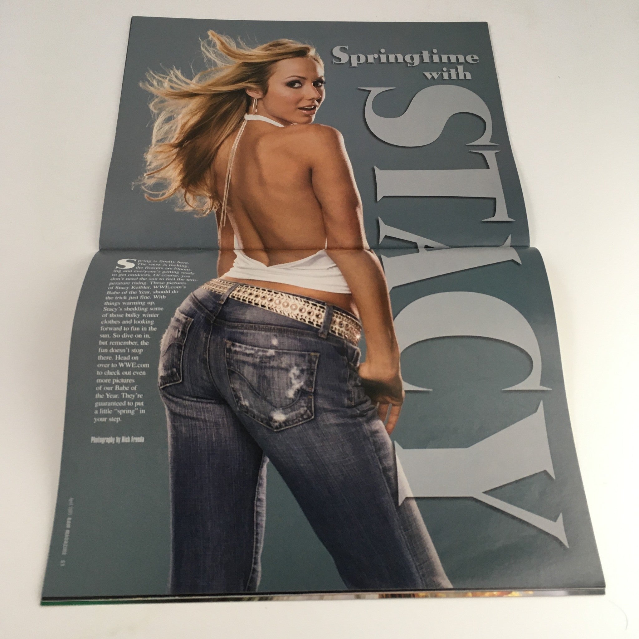 WWE Raw Magazine April 2005 showcasing model Stacy Keibler in a stunning photoshoot, emphasizing her role in WWE.