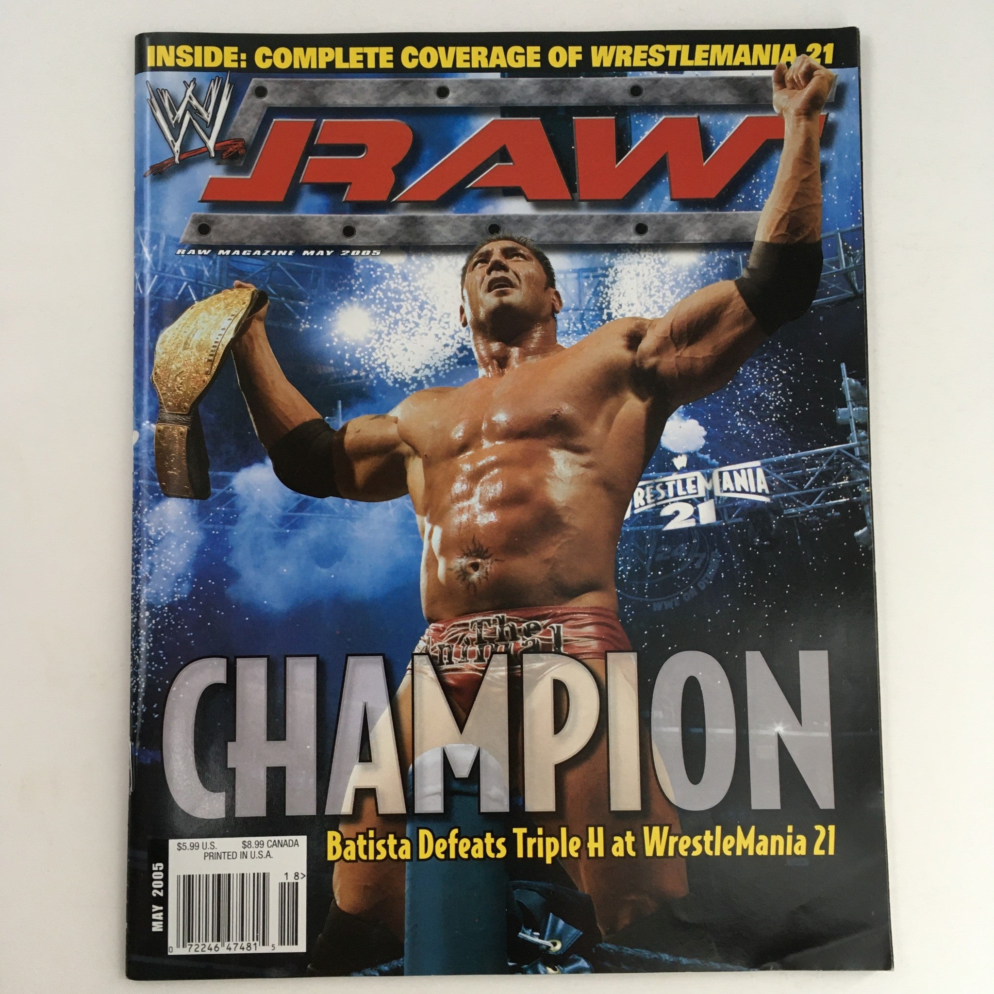 WWE Raw Magazine May 2005 featuring Batista celebrating as Champion after defeating Triple H at WrestleMania 21, showcasing iconic wrestling imagery.